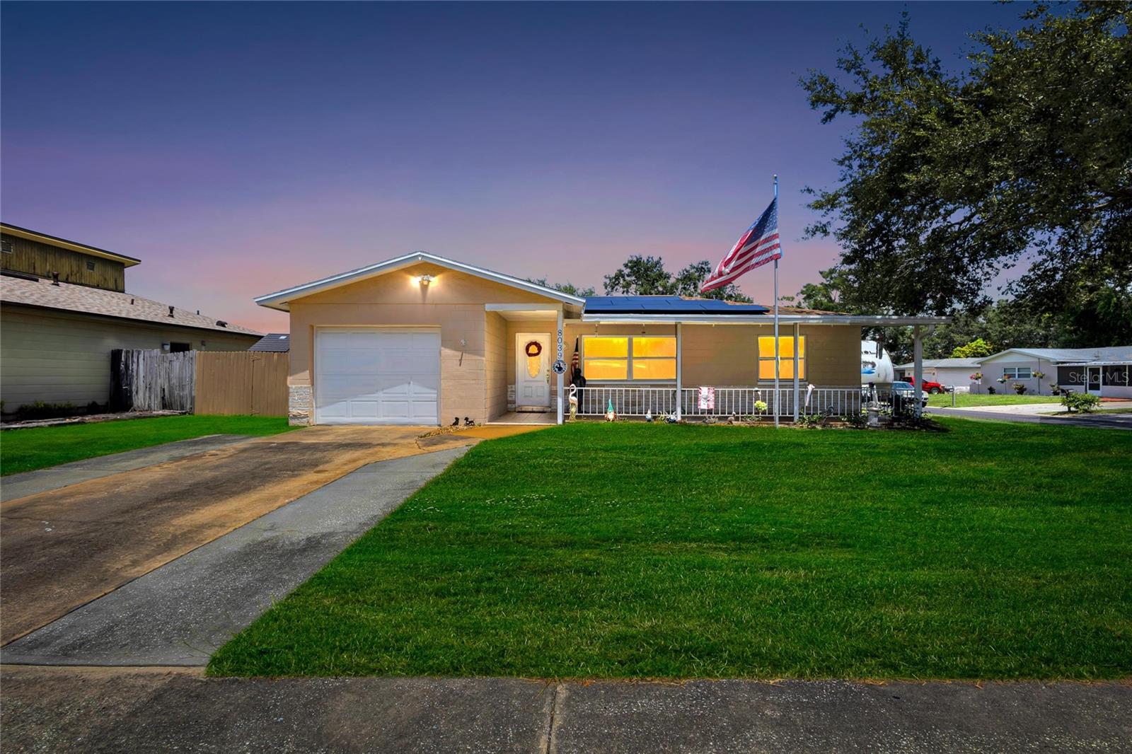 Under contract-accepting backup offers. NO FLOOD ZONE!  PRIVATE POOL HOME! NO HOA! SAVE $$$ ON LOWER UTILITY COSTS WITH SOLAR PANELS; WHICH WILL BE PAID OFF AT CLOSING FOR THE BUYER! Your Tropical Oasis Waits! Located on a spacious 1/4 Acre corner lot. Plenty of room to BRING YOUR RV/BOAT!   This home includes 4 Bedrooms, 3 Full Bathrooms, and attached garage.  The 4th Bedroom features a guest / In-Law Suite with its own private entrance! Inside the home is a 3 way split bedroom floorplan.  A Large Family Room and a BEAUTIFUL kitchen with a seated Breakfast Bar as well as a large dining area with Sliders out to your Beautiful Sparkling Free Form Style Pool.The kitchen features Sleek stainless-steel appliances, Granite countertops, tons of wood cabinets, pantry & a subway tile backsplash.   The back bedroom can be utilized as a double primary bedroom, or as a guest or In Law suite, with access from the lanai! Outside, is a beautifully maintained backyard, with a covered lanai, fire-pit, sprawling pool, Storage Shed and fenced in yard! This home has so much to offer! Do not miss out on this opportunity, call today to schedule a private viewing!