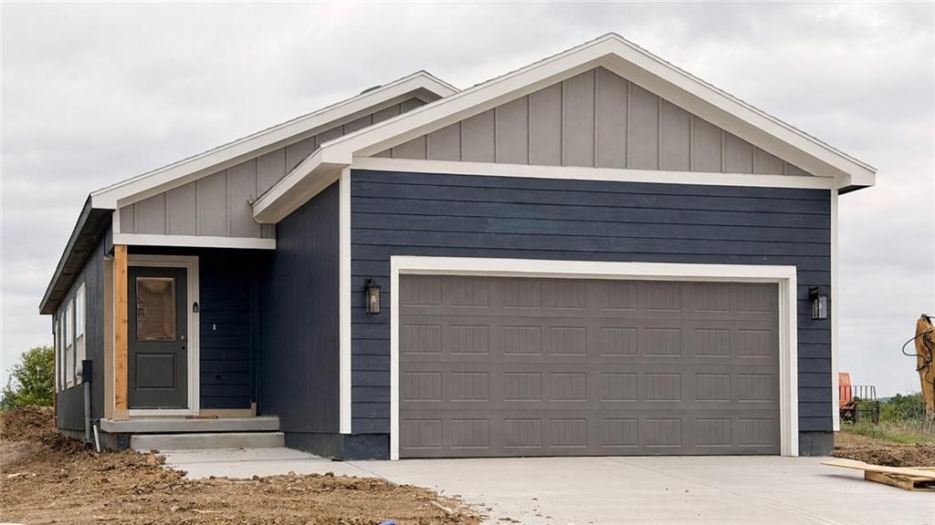 Welcome to THE most attainably priced NEW home in one of the best resort-style golf and lake communities! *Almost finished - Photos of completed home are of a previous build of this plan.*  See photos for colors and finished planned for this home.  This beautifully designed 2-bedroom, 2-bath ranch home offers superior energy efficiency, smart use of every square foot, and modern, low-maintenance living. Step inside to an open-concept layout that’s perfect for entertaining or relaxing in style. The living area flows effortlessly into the kitchen and dining space, where a large double-door pantry provides plenty of storage. Natural light floods every room, creating a warm and inviting atmosphere. The private primary suite is tucked away from the second bedroom for ultimate comfort, complete with a walk-in closet and ensuite bath. But don't forget to make time for down time lounging on the covered patio too. This home is equipped with energy-efficient lighting, high efficiency HVAC and water heater, Low-E windows with blinds, soft-close cabinetry, fully insulated garage, and basement finish opportunity to add another 751 square feet!   Eastbrooke at Creekmoor has it all! Designed around 108 acre Lake Creekmoor and the acclaimed 18 Hole Championship Golf Course, Creekmoor offers one of the most comprehensive amenities packages available, where homeowners with both active and relaxed lifestyles enjoy what feels like vacation all year long. Pools, tennis, pickleball, basketball, 24-hour fitness center, golf pro shop, Tavern on the Moor restaurant and bar, fishing, boating, SUP, and still more...it's ALL here! With an abundance of shops, restaurants and services minutes away and with easy access to Jackson and Johnson Counties, homeowners have all the benefits of metro living at their fingertips while enjoying home life outside the hustle and bustle. Whether making your first home purchase or your last, this is a destination community like no other.