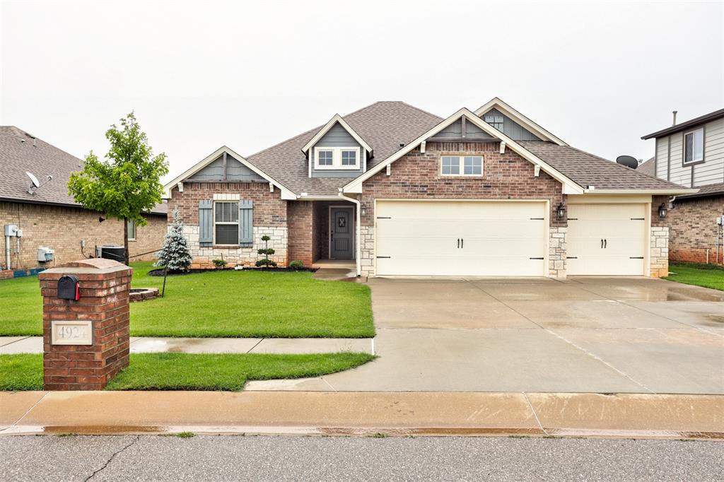 This move-in-ready home is packed with premium features! The gorgeous kitchen boasts stainless steel appliances, a gas range, and custom floor to ceiling cabinets, and granite countertops. The master suite is a true retreat, featuring a spa-like whirlpool tub and walk in shower, plus a massive closet with floor to ceiling organization. Enjoy peace of mind with a secure storm shelter and an energy-efficient tankless water heater. Take advantage of the amenities in the neighborhood on the playground or a swim in the pool or your morning/evening walks around the lake.