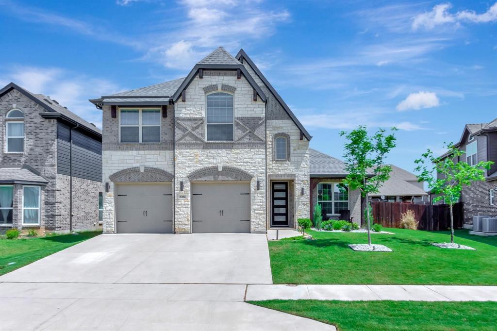 High end finish out, with curved staircase and soaring ceilings. Fireplace with stone surround and cedar mantle in the open living room. Kitchen has shaker cabinets, granite counters with a large island and stainless steel appliances. Primary features an accent wall and attached en-suite bathroom. Second living area upstairs. Large covered back porch and nice sized yard. Great neighborhood and near walking trails.