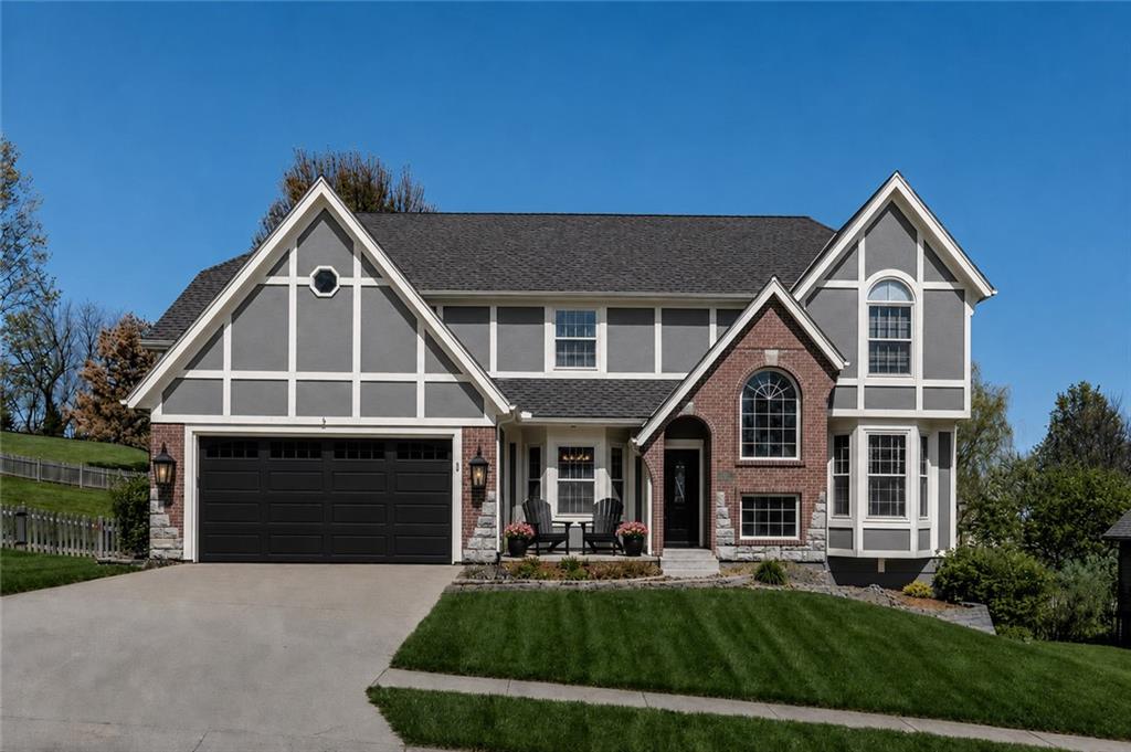Exceptional craftsmanship, timeless design, and an unbeatable lifestyle come together in this beautifully updated custom home in the highly sought-after Riss Lake community. The welcoming main level is designed for both everyday living and effortless entertaining, featuring a private home office, formal dining room, spacious mudroom, and an inviting hearth room highlighted by a stunning new stone fireplace. At the heart of the home, the completely updated kitchen impresses with custom cabinetry, granite countertops, a large center island, new appliances, an oversized walk-in pantry, and an adjoining breakfast area that creates the perfect gathering space for family and friends. Upstairs, the luxurious primary suite offers a true retreat with a spa-inspired bath and two generous walk-in closets. A private ensuite serves the second bedroom, while bedrooms three and four share a convenient Jack-and-Jill bath. Every bedroom includes its own walk-in closet, providing exceptional storage and functionality. Fresh interior paint and new carpet throughout give the home a crisp, move-in-ready feel. The finished walkout lower level is built for entertaining, featuring a full wet bar, fireplace, expansive recreation area, hobby room, and abundant storage. Step outside to a beautifully landscaped, fenced backyard with a multi-level brick patio—an ideal setting for grilling, relaxing, or hosting unforgettable gatherings. Major investments provide lasting peace of mind, including a 50-year roof, new HVAC system, whole-house Generac generator, and exceptional custom construction rarely found today. Living in Riss Lake means more than owning a beautiful home—it's enjoying one of Kansas City's premier communities with private lake access, three swimming pools, tennis and basketball courts, playgrounds, and scenic walking trails. This is a rare opportunity to own a meticulously maintained custom home where quality, comfort, and community come together.