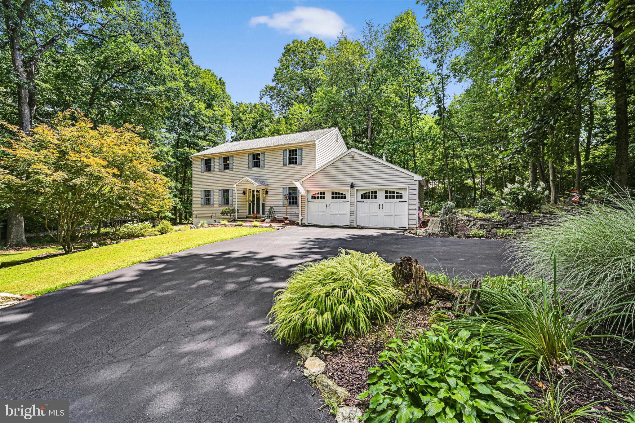 Welcome to this beautifully maintained Colonial home situated on a private one-acre lot on a quiet cul-de-sac in the desirable Tunbridge community, within the award-winning Downingtown Area School District. Offering approximately 2,160 square feet of living space, this home features four generously sized bedrooms, two full bathrooms on the second level, and a convenient half bath on the main floor, providing a functional layout for everyday living and entertaining.The traditional floor plan offers comfortable gathering spaces, highlighted by a welcoming family room with a cozy gas fireplace that flows seamlessly into the dining area and well-appointed kitchen. The kitchen features new flooring, upgraded countertops, stainless steel appliances, including a built-in microwave and dishwasher, and abundant cabinetry for storage and organization. Maple, Ash & hickory hardwood throughout the first floor, crown molding, and custom built-ins add warmth, character, and timeless appeal throughout the home. The spacious primary suite with new flooring throughout offers a peaceful retreat with a walk-in closet and private en-suite bath, while three additional generously sized bedrooms provide flexibility for family, guests, or a home office. A second full bathroom and laundry area on the upper level enhances the home's practical and well-designed layout.Additional features include a full daylight basement with ample storage and excellent potential for a future finished living space, a recreation room, home gym, or workshop, an attic with solar insulation & a solar exhaust fan providing increased efficiency with heating and cooling and a backup generator for the whole house. Other updates include a newer house and shed roof and a leaf filter gutter guard system. The home is wired for both Comcast and Verizon services, offering flexible high-speed internet options. In addition, propane gas lines have been run for a stove/oven, dryer, and water heater, providing convenient utility connections for future appliance upgrades.Step outside to enjoy the beautifully designed outdoor living space featuring extensive landscaping and stonework, a spacious composite deck, updated LED lighting and a stunning custom fire pit area that serves as the perfect gathering place for relaxing evenings under the stars or entertaining family and friends. Surrounded by tranquil wooded views, the private backyard creates an inviting setting to enjoy every season. A spacious attached two-car garage offers plenty of room for parking, storage, and everyday convenience. An additional storage shed offers extra space for tools, equipment, and outdoor belongings.Blending classic Colonial style with thoughtful updates, spacious living areas, and a picturesque setting, this exceptional Tunbridge home is ready for its next family.