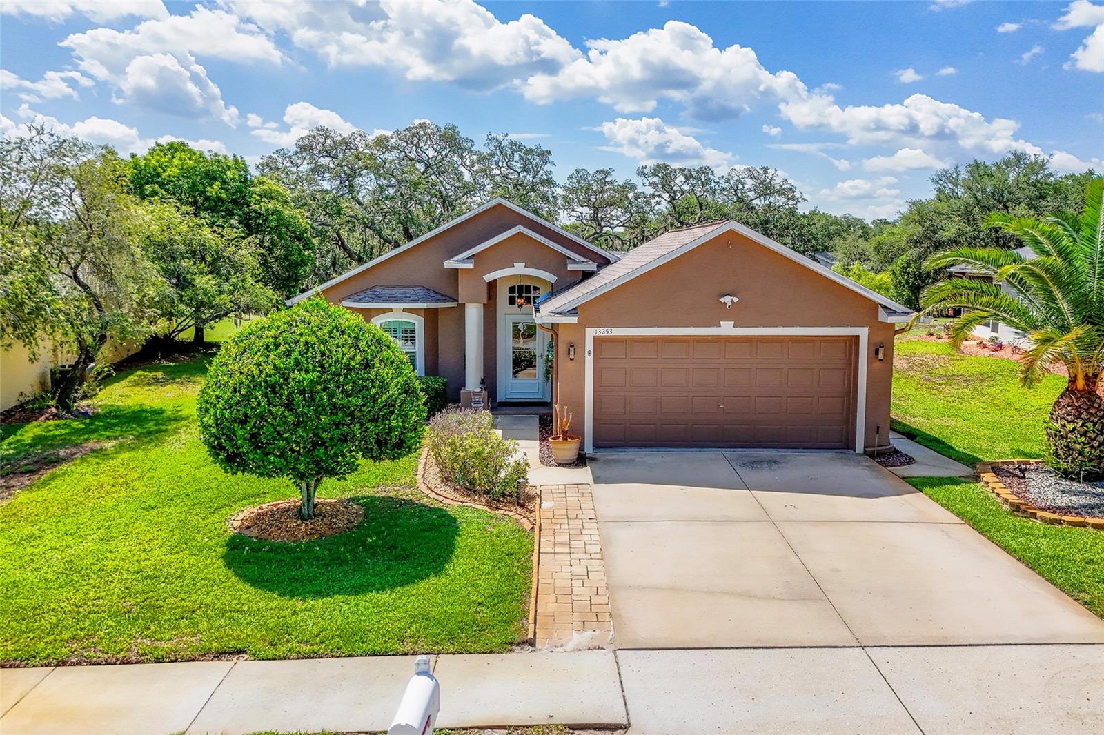 Beautifully appointed and truly turnkey, this 2-bedroom, 2-bath home with a 2-car garage offers the perfect blend of comfort, convenience, and Florida living. Nestled in a desirable low-maintenance neighborhood in centrally located Hudson, this home features a spacious screened lanai overlooking the golf course — the ideal setting to relax and enjoy peaceful views year-round. Inside, you’ll find a bright and inviting layout designed for easy living and entertaining. Whether you’re looking for a full-time residence or seasonal retreat, this move-in ready home has it all. Conveniently located near shopping, dining, medical facilities, beaches, and major roadways. Enjoy maintenance-free living in one of Hudson’s most sought-after golf course communities! HOA includes clubhouse, gym, pool, pickleball, tennis courts, landscaping, internet, cable tv, phone, irrigation, exterior house paint every 7 years, pest control, garbage. Roof 2018, AC 2023, Water Heater 2025, Windows and doors 2019.