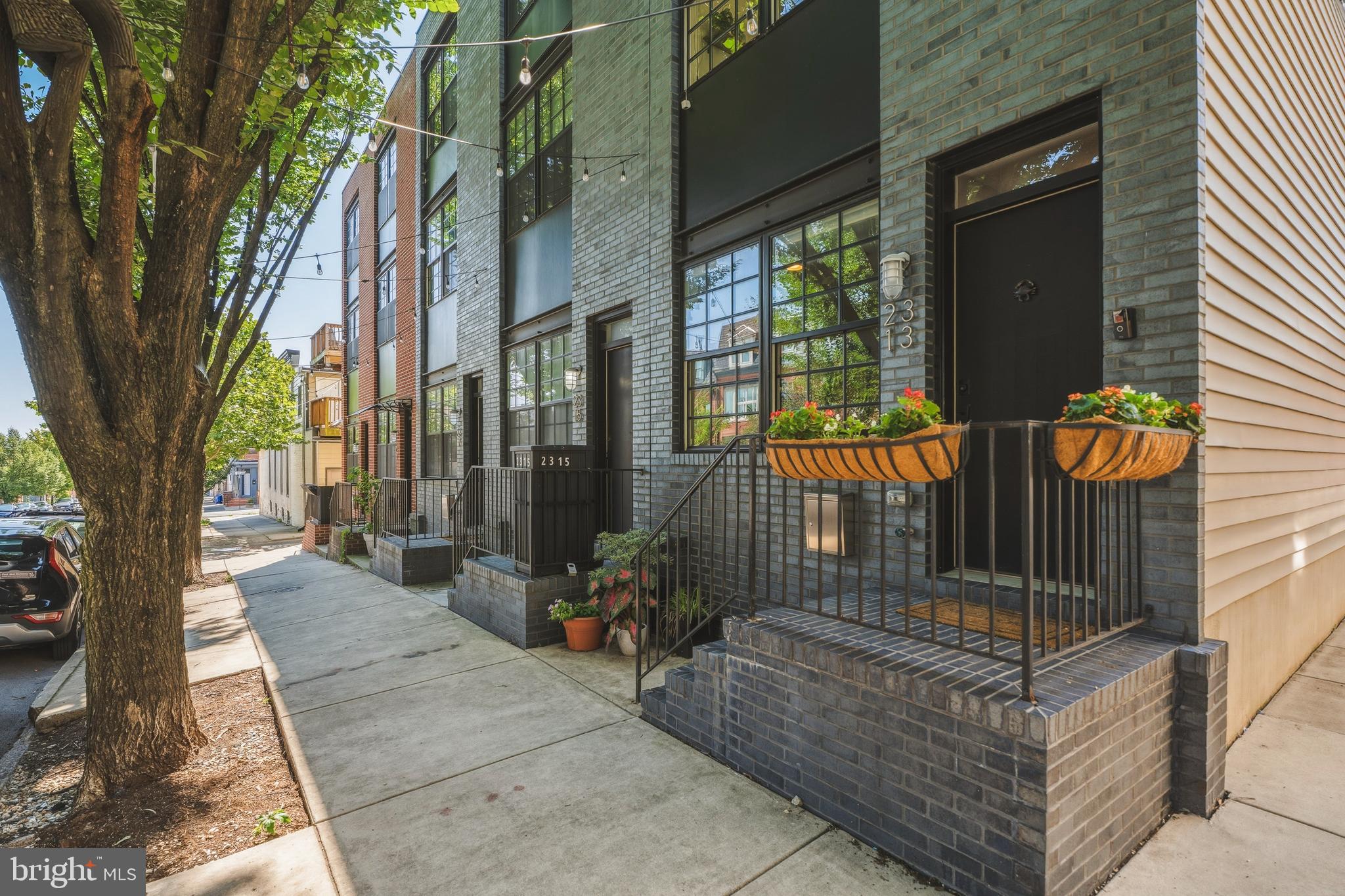 Welcome to city living at its best, just one block from Patterson Park! Built in 2015, this spacious end-unit home offers 3 bedrooms, 3 full bathrooms, and an ideal combination of modern living, outdoor space, and hard-to-find off-street parking.Inside, you’ll find a bright, open layout with the added natural light that comes with an end-unit home. Just off the kitchen, step outside to the covered porch; perfect for morning coffee, grilling, or relaxing outdoors. Head upstairs to the rooftop deck and take in incredible views of the city, creating the perfect spot for entertaining or unwinding at the end of the day.Parking in the city is easy with both a private garage and additional parking pad. And with Patterson Park just a block away, you’ll have one of Baltimore’s best outdoor spaces practically at your doorstep, while still being convenient to the restaurants, shops, nightlife, and amenities of the surrounding neighborhoods.Built in 2015 and offering 3 bedrooms, 3 full baths, multiple outdoor living spaces, a rooftop deck, garage, parking pad, and an unbeatable location: this is the kind of city home that checks all the boxes.