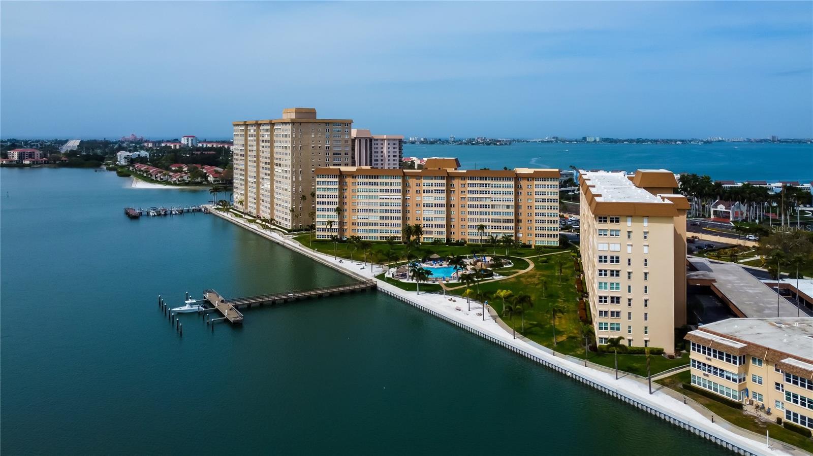 Welcome to this inviting, waterfront one-bedroom, one-and-a-half-bath condominium offering approximately 1,185 square feet of comfortable living space in the desirable 55+ community of Point Brittany. Situated on the sixth floor, this residence features spectacular views of the Bay and Intracoastal Waterway, creating a beautiful backdrop for everyday living, with stunning sunrises and sunsets! The open kitchen, dining, and living areas provide a welcoming space to relax or entertain, while the furnished interior offers the convenience of a move-in-ready home or seasonal retreat. Three storage units and convenient covered parking add to the tremendous appeal.Enjoy an exceptional array of resort-style amenities, including four heated swimming pools, a hot tub, tennis and pickleball courts, shuffleboard, a fitness center, saunas, and an impressive residents’ club. Take a leisurely stroll along the waterfront walking path, spend an afternoon fishing from the pier, or enjoy the outdoor pavilion and fire pit with friends and neighbors.The community’s tropical landscaping and stunning waterfront setting create a peaceful escape, yet you’re conveniently located near the sugar sands and turquoise waters of the Gulf beaches, and only a short drive to downtown St. Petersburg's thriving dining, arts, and cultural scene-this is Florida living at its finest!Whether you’re seeking a full-time residence, a seasonal getaway, or a furnished waterfront retreat, Apartment 606 offers an inviting opportunity to enjoy the best of Florida’s coastal lifestyle at a very affordable price. Come experience the perfect blend of sophistication and serenity in your own private waterfront oasis.