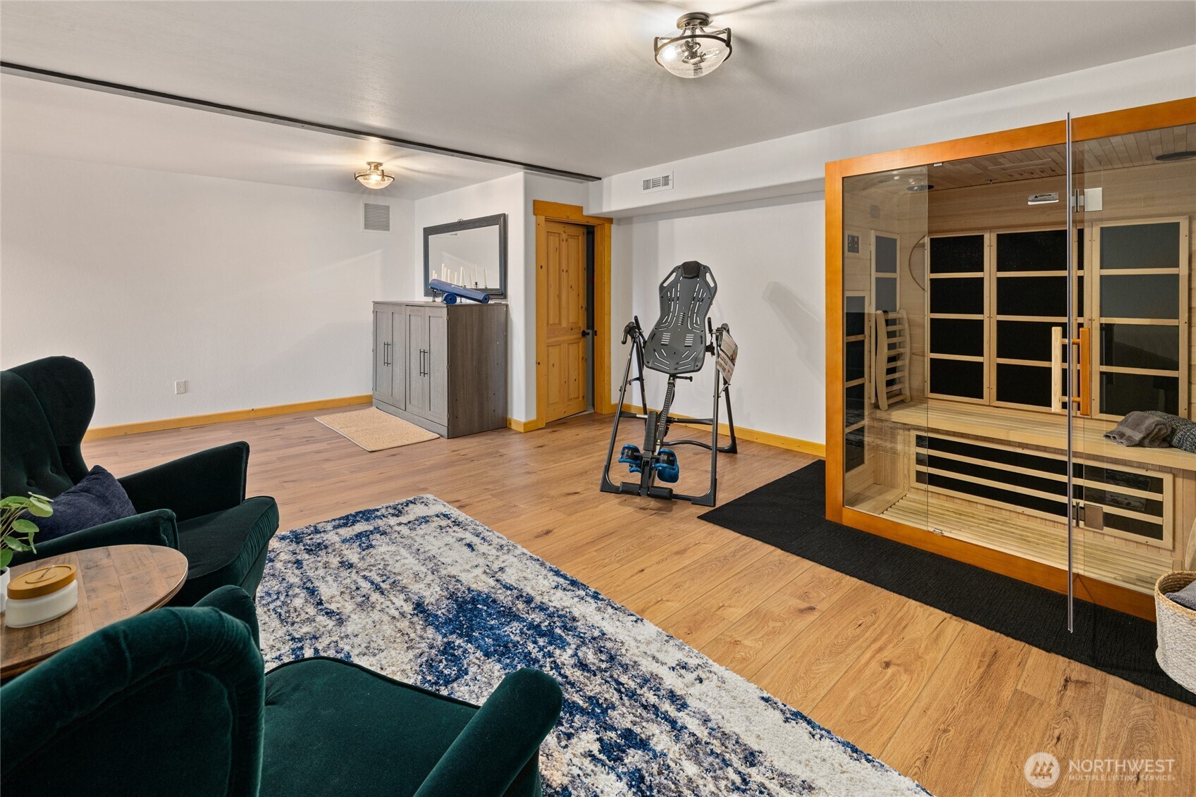 Flexible lower-level bonus space with an infrared sauna and room for fitness, wellness, or additional recreation.