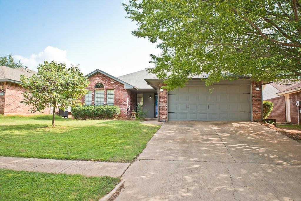 3 bed/2 bath house in Eagle Cliff in Norman! The Living room has a corner brick gas log fireplace, 1/2" engineered hardwood flooring that is also seen in the hall and two bedrooms. Kitchen is updated with  backsplash, granite countertops and tile flooring, with the stainless fridge included. Dining room has a chalkboard accent on the wall. Master suite has an attached bathroom with double sinks, a soaking tub, and separate shower; also has walk-in closet accessed from bedroom. Backyard includes a privacy fence and oversized open air concrete patio. Storm shelter in garage. Online application -$42 fee for
each adult. Dogs okay on case to case basis with non-refundable pet fee. No Cats! Renter insurance is required.