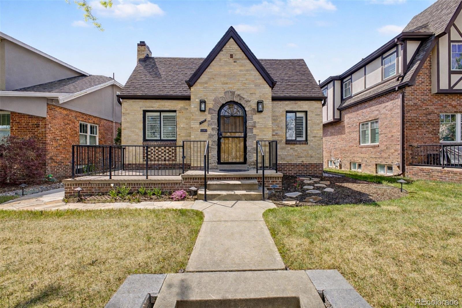 Welcome to 475 S Race St—an exceptional, fully renovated Tudor blending timeless charm with modern luxury in one of East Wash Park’s most sought-after locations.A welcoming entry opens to a spacious living room anchored by a striking new fireplace, flowing seamlessly into the dining area and beautifully remodeled kitchen featuring extensive cabinetry, a large island, quartz countertops, stainless steel appliances, and abundant natural light—ideal for both everyday living and entertaining. The main floor also includes a generous primary suite offering a true retreat with a walk-in closet, washer/dryer hookups, and a luxurious five-piece ensuite bath, along with a well-appointed powder bath.The fully finished basement is bright and airy with high ceilings and egress windows. Two conforming bedrooms each feature ensuite baths and walk-in closets, plus a large family room, additional laundry with new washer and dryer, and ample storage.Outside, enjoy a private, thoughtfully landscaped yard featuring a new patio with gas hookup and firepit—ideal for relaxing or entertaining.The oversized two-car garage with alley access is a standout, featuring non-slip epoxy flooring, T111 interior walls, a Container Store system, workbench, and LED lighting. An additional off-street parking space adds convenience.A rare turnkey opportunity in an unbeatable location just moments from Wash Park.Recent Major Updates Include:New FireplaceNew plumbing and electrical systemsNew sewer lineNew HVAC systemNew radon mitigation systemNew windows and doorsNew garage finishes