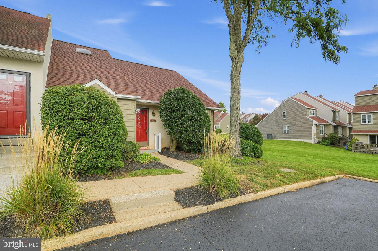 1205 Saint Andrews Ct | End-unit townhome in Liongate | Private upper-level primary suite | Downingtown Area School DistrictWelcome to this 3-bedroom, 2-full-bath end-unit townhome in the Liongate community of Chester Springs. The floor plan gives buyers options most townhomes don't: two generously sized bedrooms and a full hall bath on the main level, with the entire upper level given over to a private primary suite — a bright, spacious bedroom, a large walk-in closet, and a full bath.Hardwood flooring runs through the entry and main living areas. The kitchen opens to the living and dining spaces, with a large eat-in area alongside it that works for a dining table or hutch, and laundry is conveniently located on the main level, with a new washer and dryer. Downstairs, the large finished basement with a wet bar and recessed lighting adds real living space — media room, home gym, playroom, or home office. An unfinished portion of the basement provides additional storage. Mature landscaping creates a cosy private patio space out back. The home features a brand new roof (Sept 2026) and water heater (2025). All three levels were freshly painted September 2026, with new carpet in the first-floor bedroom. Additional storage is available with attic access off the upstairs bathroom.Liongate is a low-maintenance Chester Springs community with a swimming pool, clubhouse, playground, basketball court, dog park, and lawn care included — the kind of place where summer means walking to the pool and letting someone else handle the yard. The home also includes one numbered parking spot. Directly across the street is Milky Way Farm and Chester Springs Creamery, a working family dairy where ice cream in the evening is a neighborhood habit and seasonal CSA shares come from the farm itself. A few minutes out, Marsh Creek State Park opens up to boating, kayaking, and miles of trails.  Sq Ft. based on public records - Buyer to verify. The Lionville location handles the rest: Exton shopping and dining, Limoncello and Ron's Original Bar & Grille, downtown Phoenixville, SEPTA rail access, and quick connections to the PA Turnpike and Routes 100, 113, and 401. Downingtown Area School District.For first-time buyers relocating to Chester County or downsizing buyers searching the Philadelphia suburbs, 1205 Saint Andrews Ct offers an end-unit floor plan, a community that handles the maintenance, and a home ready to move into.