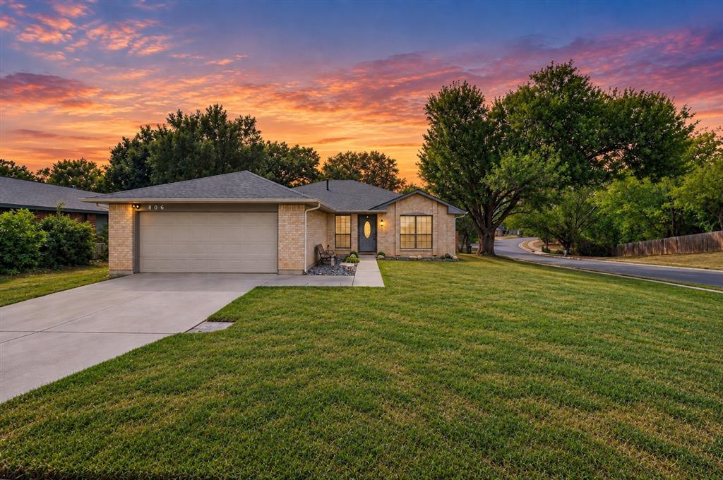 Situated on a spacious .387-acre corner lot, this beautifully updated home offers a comfortable layout with plenty of space both inside and out. Thoughtfully updated throughout, the home features engineered wood flooring, two inviting living areas, and a brick fireplace that creates a warm focal point in the main living space. The well-appointed primary suite offers a walk-in shower and convenient his-and-her closets. Outside, the generous backyard provides plenty of room to relax, play, or entertain, with a large deck creating an ideal setting for outdoor gatherings. A new roof installed in 2025 adds to the home's appeal and peace of mind. Conveniently located with easy access to Hwy 183 and Hwy 360, while just approximately 6 miles from DFW International Airport, this home offers a great combination of space, updates, and accessibility.
