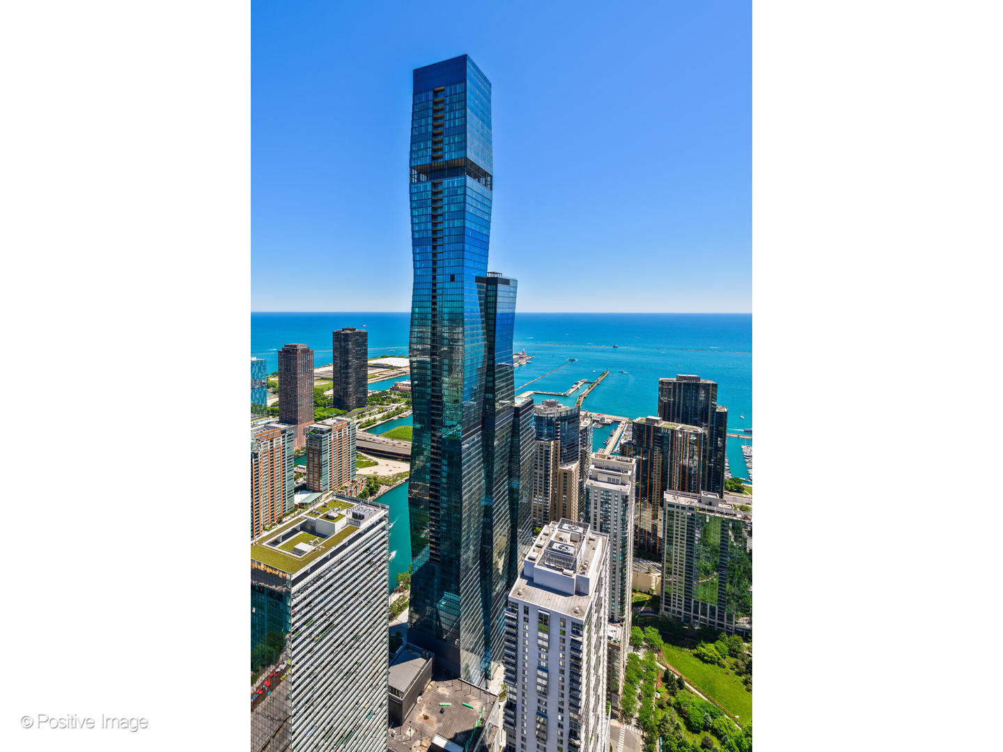 Extraordinary 4-bedroom plus office (optional 5th bedroom), 4-bath residence offering 4,831 square feet of sophisticated luxury living at the iconic St. Regis Chicago, Chicago's premier full-service residential tower. Two valet parking spots are available for an additional $100,000. This stunning home seamlessly blends five-star hotel services with the intimacy and comfort of a private residence. Thoughtfully designed and impeccably finished, the interiors showcase Italian custom built-ins, modern light fixtures from Lightology, wide-plank hardwood floors, Sonos expanded sound system, Lutron automated blind system from Intellis, and refined designer details throughout. A gracious entry gallery sets the tone, featuring custom millwork by Jesse Chicago and gallery-style wall space ideal for displaying a curated art collection. The expansive living and dining room is anchored by a bio ethanol fireplace and framed by dramatic floor-to-ceiling windows offering rare South, West, and North exposures with sweeping views of Lake Michigan, the city skyline, and unforgettable sunset vistas. This exceptional vantage point creates a breathtaking backdrop for everyday living and entertaining. Adding to the home's appeal are two distinct and dedicated living spaces, creating a truly unique and highly functional floor plan-ideal for both formal entertaining and relaxed everyday living. The secondary living area offers great flexibility such as a media lounge, family room, or private retreat. The chef's kitchen is both elegant and highly functional, appointed with Snaidero cabinetry, cantilevered stone countertops, a full Gaggenau appliance suite, and an oversized island with seating. Completely custom to this unit, a fully equipped scullery offers exceptional additional storage and prep space, including a full-size Thermador refrigerator and Sub-Zero wine/beverage center. Just beyond, a covered balcony provides the perfect setting for grilling, relaxing, and dining al fresco while enjoying skyline views. Designed for elevated entertaining, the adjacent family room features a striking wall of custom built-ins with fireplace and a custom bar with Valcucine cabinetry equipped with a New Logica system and Liebherr refrigeration drawers, complemented by a glass-enclosed, temperature-controlled wine cellar by Genuine Cellar, creating a true private lounge experience within the home. The private primary suite is a serene retreat, offering beautiful city views, two custom walk-in closets, and a spa-caliber marble bath with oversized shower, soaking tub, Kallista fixtures, heated towel bars, dual vanity, Robern medicine cabinets, and full-height stone walls. A versatile bonus room just outside the primary suite functions perfectly as a home office, library, or fifth bedroom, with a full bath conveniently located across the hall. Three additional generously sized bedrooms - (one with an Italian Murphy bed system), two bathrooms (one en-suite), and a dedicated laundry room with additional storage designed by California Closets complete the residence. Residents enjoy unparalleled access to both private condominium amenities and full St. Regis hotel services, including concierge and butler services, in-residence dining, renowned restaurants Tret Dita and Miru, indoor and outdoor pools, spa, state-of-the-art fitness and training studios, private dining room, demonstration kitchen, wine storage and tasting room, private storage, and enclosed dog exercise area. Entertaining is effortless with on-demand event support, tableware, seating, and white-glove service. Ideally located in the heart of Lake Shore East, just steps from the lakefront, world-class dining, shopping and cultural institutions. This is a rare opportunity to own a turnkey, trophy-quality residence in one of Chicago's most prestigious and sought-after addresses, offering panoramic views, a distinctive dual-living layout, five-star service, and an unmatched luxury lifestyle.