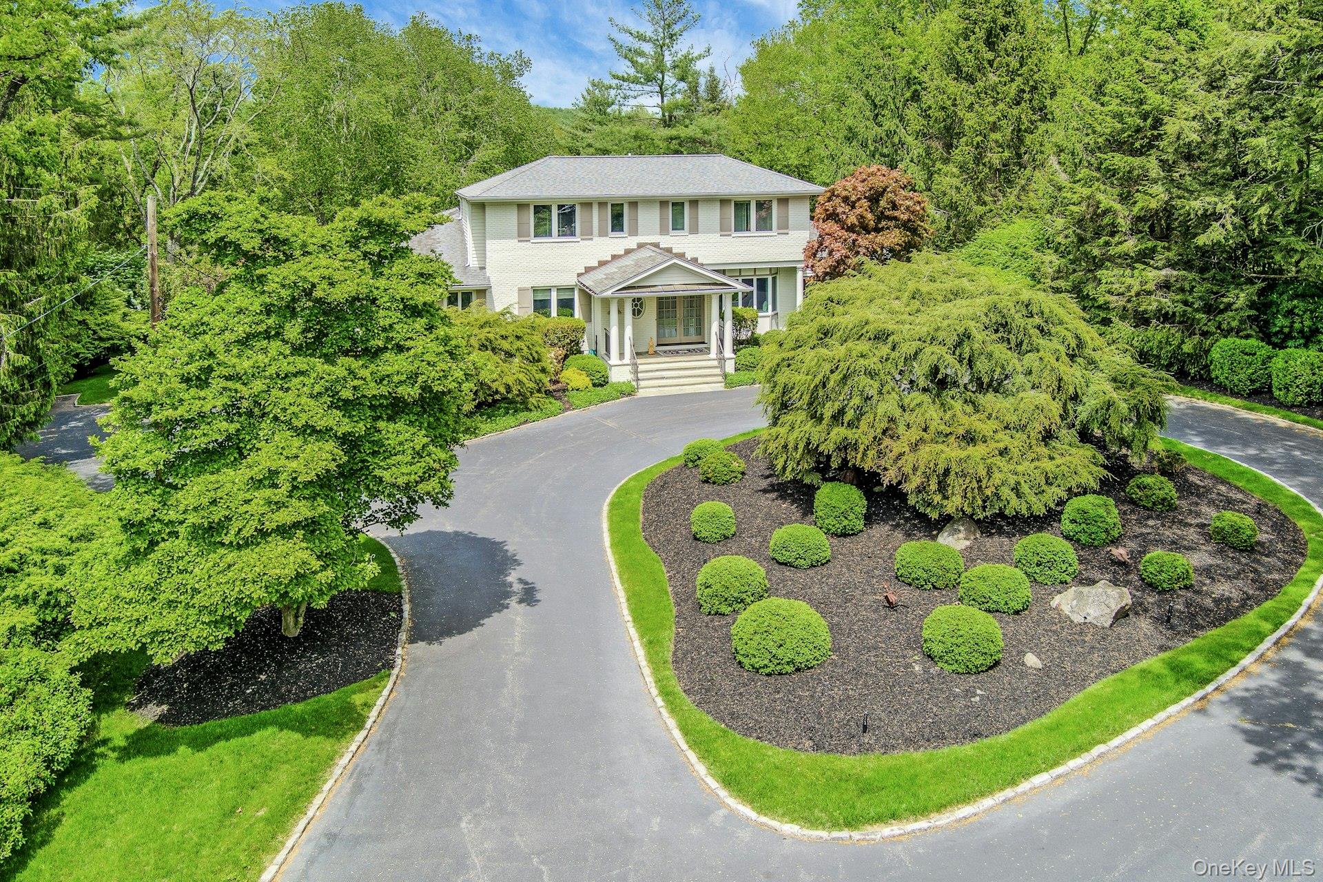 Welcome to your private oasis! This four bedroom (lives like a 5) and five and a half bathroom home with pool, patio, and Har-tru tennis court is like having a country club in your own backyard. Renovated and expanded less than ten years ago, this beautiful Bedford property (Byram Hills schools) will allow for time with friends and family or reading a good book on a sunny summer day. When you enter through the front door, you will immediately notice the elegance and warmth of the home. View the manicured grounds from the expansive kitchen/dining area with stairs to the outside. The primary suite with spa-like bathroom is conveniently situated on the first floor. Another bedroom/office is located on the main floor as well as two more bedrooms (all ensuite!) upstairs. A beautiful dining room and living room with built-in cabinetry, as well as a large laundry room and mudroom, round out the first floor. The fully finished lower level (with gym and another full bathroom) also accesses the pool and tennis court.Come see this special property and make everyday feel like a vacation.