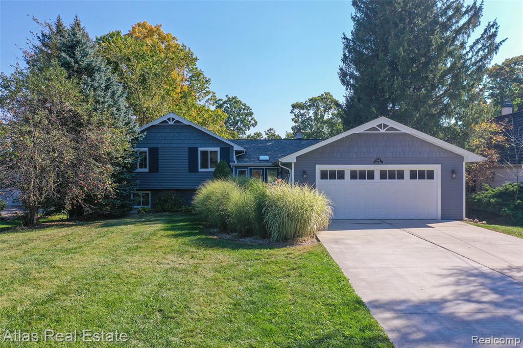 This is your perfect opportunity to snag yourself that waterfront home on private all sports Lake Shinanguag!  Timing is key with enjoying the fall vibes and beautiful winter view all while making this home your own perfect entertaining oasis for the summer.  Boasting over 2700 sq ft of finished space, this home offers panoramic lake views from all levels.  The kitchen will not disappoint with many upgrades including top notch appliances, granite countertops and cherry cabinets; perfect for entertaining with its open concept to the dining and living room.  The walkout basement ushers you out to one of 4 decks (3 of which were completely updated with new boards and railings), where you'll find a relaxing hot tub and your private 90 ft of water frontage.  The basement also has an extra 5th bedroom or office space with its own private entrance.  Updates include 1. New roof, gutters and sky light (2024) 2. New water softener (2024) 3. New boiler (2021) 4. New siding (2020) 5. Deck board and railing (2023-2025) 6. Split zone air conditioning/heat pump (2015) 7. New cement driveway (2019) 8. New well pump and tank (2024) 9. Sewer grinder pump for lower level bathroom (2024) and septic tank pumped (2024).  So grab your family and move right in!  This home is a must see and priced to sell.  Located in the desirable Goodrich Community School District.  Washer and Dryer not included in sale.