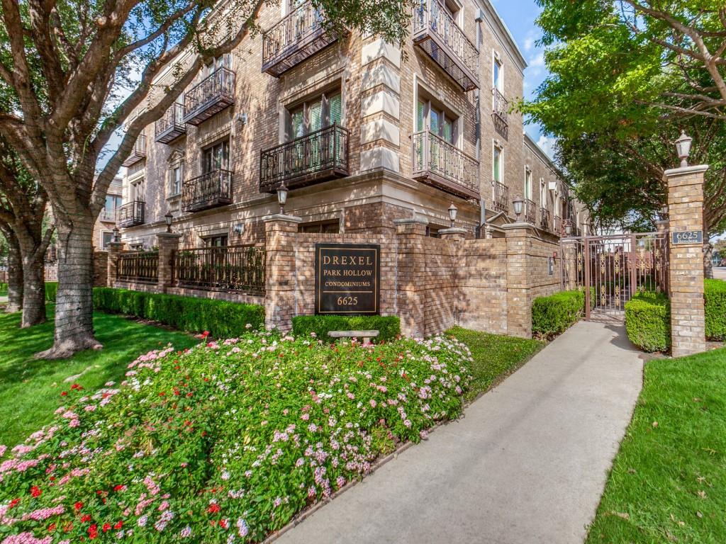 Two spacious ground floor outdoor patios surrounded by an elegant wrought iron fence. Your living room, dining room, and owners' suite all feature floor to ceiling windows with outdoor views. This could be your home! Situated in prestigious Preston Hollow and mere steps from multi- million-dollar homes, this incredibly unique corner condominium is located in the coveted Drexel Park Hollow Condominiums. Located on the ground floor, this property has soaring 10-foot ceilings, custom mahogany built-in's and gracious moldings. Inviting and large owner's suite has room for a seating area and has large walk-in closet. The guest room has bath en suite and another walk-in closet. Bedrooms feature hardwood floors. The home boasts an open floor plan which is quite versatile, and the private and secure underground parking and a secured storage unit is just steps from the home.