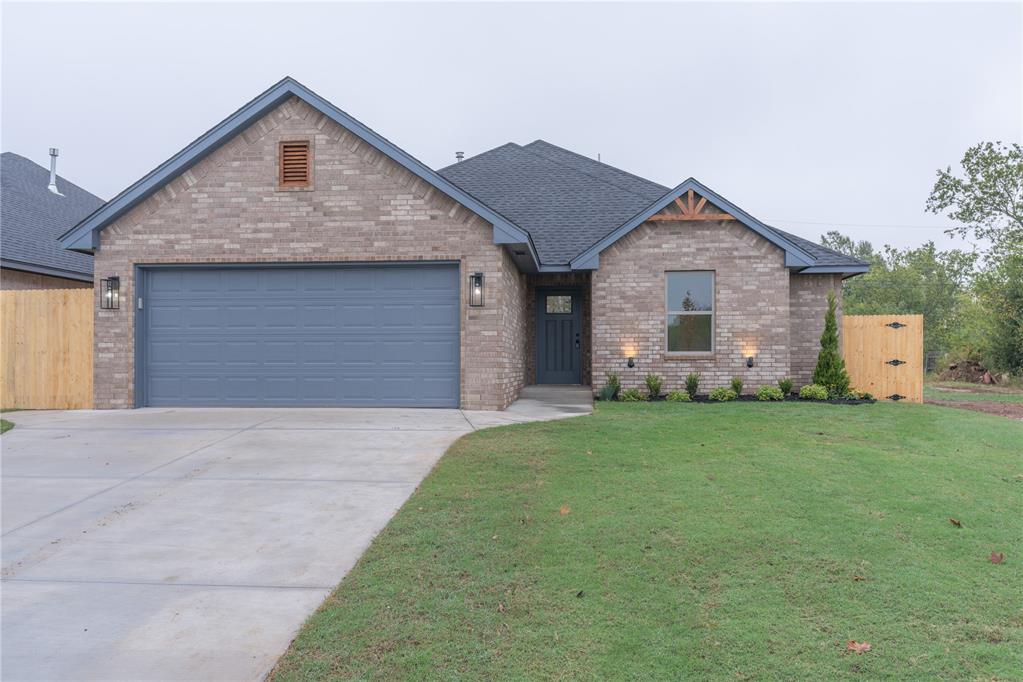 Welcome to this brand-new 3-bedroom, 2-bathroom home, perfectly situated in a desirable NW OKC location offering quick access to the Broadway Extension and just moments from the vibrant dining and shopping of the Britton District. This meticulously built home features an open-concept layout with wood-look tile flooring flowing throughout. The heart of the home is the kitchen, which boasts ample cabinetry, a large center island, sleek granite countertops, a built-in microwave, and stainless steel appliances. The spacious primary suite offers a private retreat with an en-suite bath complete with dual vanities, granite countertops, and a large walk-in tiled shower. Outside, enjoy the fully fenced backyard and the generous covered porch area, ideal for relaxing or entertaining.