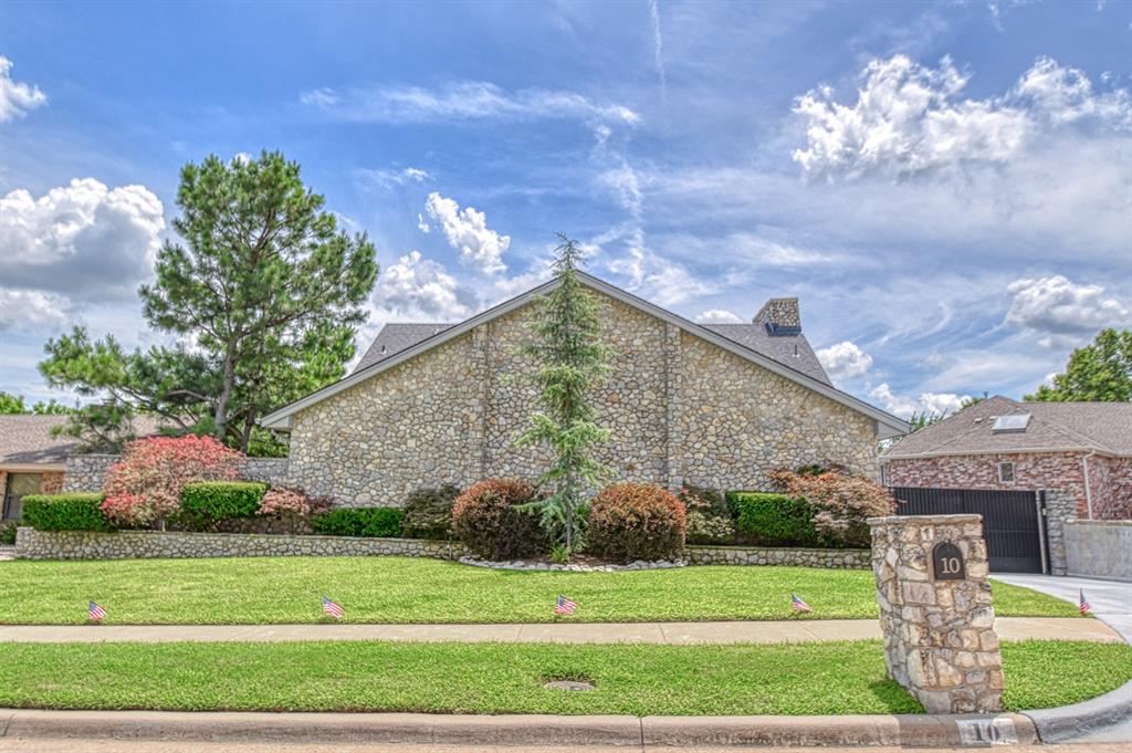 This beautiful, spacious home is a must-see! Featuring 5 bedrooms and 3 full baths, it offers exceptional comfort and style throughout. The gourmet kitchen boasts sleek quartz countertops and a high-end Thermador cooktop—perfect for any home chef.  Natural light floods the living areas through an abundance of windows, offering serene views of your private backyard retreat. Step outside to enjoy a resort-style oasis complete with:
Sparkling pool, Tranquil koi pond with waterfall, Fully equipped outdoor kitchen with a smoker and pizza oven
and a Greenhouse that has a heater/air cooling system for year around comfort. Upstairs, a large bonus room provides flexible space—ideal for a home gym, office, or media room. The walk-out attic adds convenient storage or potential for additional living space.  Underground shelter/hobby room.  All appliances which were replaced in 2023 will stay with the property. New windows and generator in 2023.  The tile around the salt water pool were replaced in 2024 along with a new pump and filter.  Kitchen countertops are engineered quartz which is heat tolerant like a built in hot pad, indestructible.  All mounted TV's stay with home. Please note that the photos of the game room with pool table came out too light.  The walls and pool table are crimson.