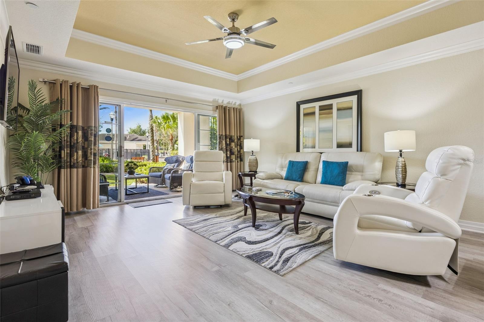 LOCATION, LOCATION, LOCATION!This beautifully updated, fully furnished 3-bedroom, 3-bath condo in Reunion Resort offers the perfect blend of convenience, comfort, and investment potential. Ideally situated just steps from one of the community’s outstanding pools, you can walk right out from your private patio and enjoy resort-style living—while still having enough distance to relax in peace and privacy.This first-floor, turnkey unit is designed for effortless living, with no stairs—perfect for easy grocery trips, guests, or pet owners. Whether you're looking for a short-term rental investment or a personal vacation retreat, this property is ready to go from day one.Inside, you’ll find:A fully equipped kitchen with stainless steel appliances and granite countertopsBrand-new luxury vinyl plank (LVP) flooring throughout—no carpetA smart, spacious layout with each bedroom featuring its own private bathroomA generous primary suite complete with two walk-in closets, dual sinks, a soaking tub, and a separate showerStep outside and take in the amazing view, all while being just moments from the pool behind the unit.Reunion Resort’s unbeatable location—just two exits from Disney World—makes it a top destination for visitors year-round. Owners and guests enjoy access to 12 community pools and five on-site dining options, ranging from casual bites at The Cove to upscale dining at Eleven.This is your opportunity to own a true piece of paradise—perfect as a vacation home, income-producing property, or both.