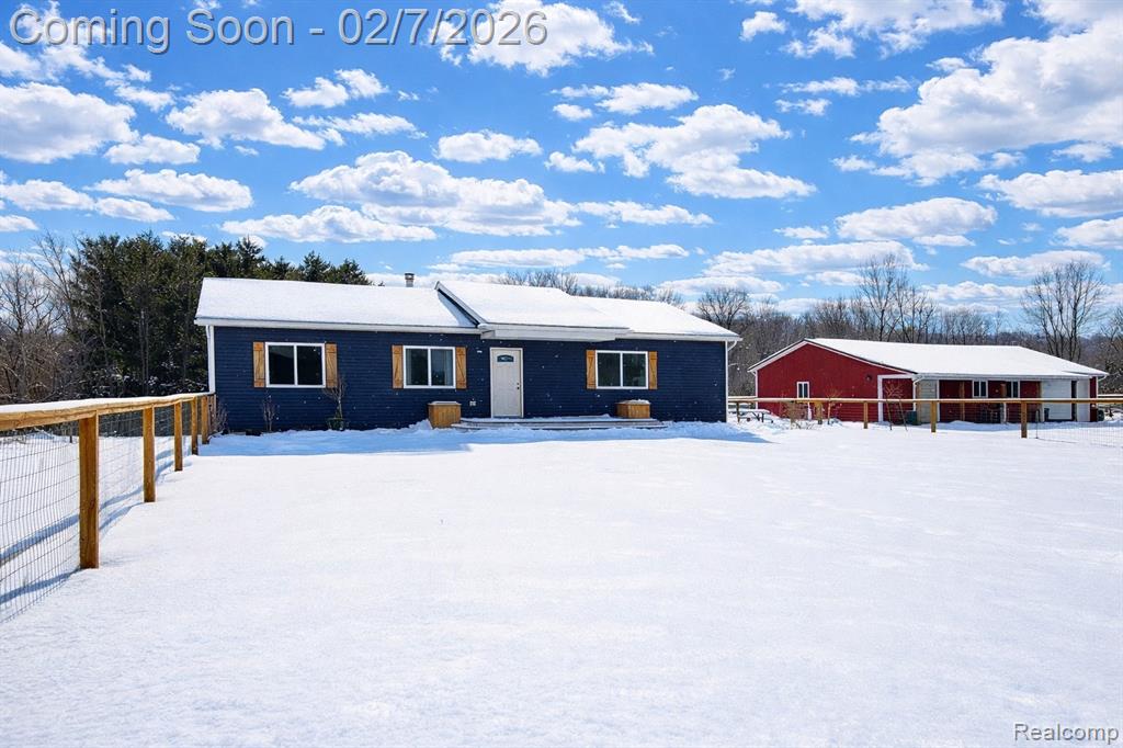 Open House Sunday, 2/8/25 from 1-3 P.M. Welcome to 2193 Hummer Lake Road, a rare opportunity to enjoy rural living on 11.7 picturesque acres in desirable North Oakland County. Built in 2017, this thoughtfully designed, move-in-ready ranch home offers the perfect blend of modern comfort and country lifestyle—ideal for hobby farmers, livestock owners, or anyone seeking space, privacy, and freedom.This stately residence features 5 spacious bedrooms (including 3 on the main level and 2 in the walkout lower level), 3.5 bathrooms, and over 2,600 square feet of living space. High-quality LVP tile flooring and an open-concept layout connect the fully applianced kitchen, complete with a walk-in farmhouse pantry to the dining area and great room, where a cozy wood-burning fireplace anchors the heart of the home. A convenient first-floor laundry, central air, and underground high-speed internet ensure modern ease without sacrificing the charm of country living. The generous primary suite offers peaceful views of your private acreage, along with a walk-in closet and private full bath. The partially finished walkout basement provides excellent additional living space and is easily customizable—just add flooring to make it your own. Outside is where this property shines. Extensive small-livestock fencing, wide-open pastures, scenic woodland teeming with wildlife and a 32x48 pole barn with a covered veranda, finished office space, and overhead door make this an exceptional setup for farming, animals, hobbies, or equipment storage. Whether you envision morning chores, gardening, or simply soaking in the quiet countryside, this property supports the lifestyle you’ve been dreaming of. Located in the highly regarded Brandon School District with quick access to M-15, this is a rare combination of acreage, modern construction, and convenience. A true must-see for those seeking space, serenity, and a move-in-ready home built for country living.