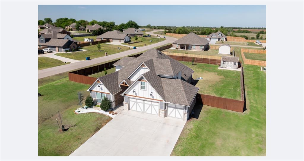 BETTER THAN NEW  *Large .62 Acre Lot  *Shop Approved *NEWCASTLE SCHOOLS  *10 foot ceilings *Wood Look Tile *Open Concept *Spacious Bonus Room *Extended and Covered Back Patio Area *Mini split heated/cooled 3 Car Garage  Beautifully maintained 4 bed 3.1 bath home with an open concept layout in the main living area with cozy fireplace. Stainless Steel appliances, ( refrigerator stays), Double door pantry and massive island. Large utility room and beautiful mud bench right off the 3 car garage entry to the house.  Master bath features a free standing tub, walk in shower, water closet and double vanity sinks. 3 beds and 2.1 bathrooms downstairs and an additional bedroom and full bathroom and bonus room upstairs. Security cameras remain with home. RV hookup too. Wide open spaces in a peaceful neighborhood with easy access to the entire OKC metro.