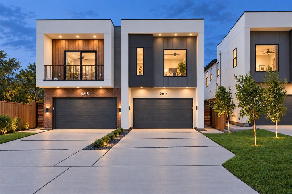 Rooftop skyline views, an expansive backyard, and a prime location directly on the Santa Fe Trail, urban living done right. Offered at $749,500, this newly constructed modern single-family attached home delivers nearly 2,600 square feet of thoughtfully designed living space, just minutes from White Rock Lake, Lower Greenville, Lakewood, and Downtown Dallas. Quality construction pairs premium materials, stucco, brick & siding exterior, energy-efficient systems, including ZIP System sheathing and waterproofing, encapsulated spray foam insulation, energy-efficient windows, and a tankless gas water heater. Inside, soaring ceilings and abundant natural light frame an open-concept layout anchored by an oversized kitchen island, custom floor-to-ceiling cabinetry, and a sleek fireplace. White oak cabinetry in the kitchen and every bathroom, designer tile, statement lighting, and carefully selected fixtures bring warmth and sophistication throughout. The primary suite features two walk-in closets and a spa-inspired bath, while the other bedrooms offer comfort and privacy. Smart thermostat and lighting, low-voltage wiring, a built-in security system, modern appliances, and an oversized garage with an EV charging outlet enhance everyday convenience. Outdoor living sets this home apart. A large covered patio opens to an oversized backyard with room for a pool, pets, and entertaining, plus a dedicated fire pit area with string lights, for those who enjoy relaxing under the stars.  Above it all, a private rooftop deck showcases Downtown Dallas skyline views. A builder’s warranty completes this exceptional blend of modern design, quality construction, and connected city living.