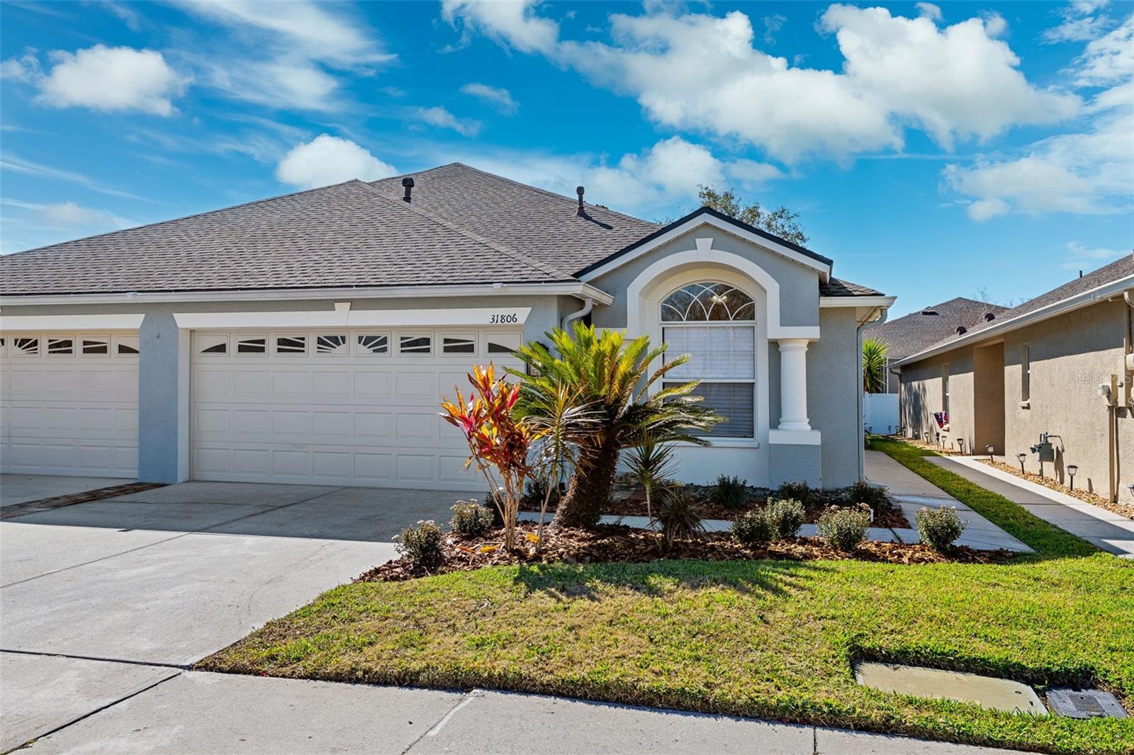 One or more photo(s) has been virtually staged. Welcome To Larkenheath, A Gated Enclave Of Villa-Style Homes Within The Highly Desirable Meadow Pointe Community In Wesley Chapel. This Fully Renovated 2-Bedroom, 2-Bath Villa With A Den/Office/Flex Space And 2-Car Garage Offers The Perfect Blend Of Modern Style, Comfort, And Truly Low-Maintenance Living — Making It Ideal For Primary Residents, Downsizing Buyers, Or Investors Seeking A Strong Long-Term Rental Opportunity.Step Inside To A Bright, Open-Concept Floor Plan Featuring Fresh Interior Paint, Luxury Vinyl Plank Flooring, Stylish New Lighting Fixtures, And LED Recessed Lighting Throughout. The Stunning Kitchen Is A Chef’s Dream With Brand-New Stainless Steel Appliances (With Full Manufacturer Warranties), Quartz Countertops, Shaker-Style Soft-Close Cabinetry, And A Breakfast Bar Overlooking The Spacious Dining Area — Perfect For Everyday Living And Entertaining.The Private Primary Suite Is A Peaceful Retreat Offering An En-Suite Bath With Dual Vanities, Picture Mirrors, Upgraded Lighting, And A Walk-In Glass-Enclosed Shower. The Versatile Den Provides Flexible Space Ideal For A Home Office, Guest Room, Or Hobby Space.Enjoy Outdoor Living On The Covered, Screened-In Lanai, Perfect For Morning Coffee Or Relaxing Evenings. Exterior Upgrades Include A Newer Roof (2022) And A Partially Fenced Yard With Rare HOA Approval For A Full Fence — Ideal For Pets And Added Privacy.Residents Enjoy Resort-Style Amenities Including A Swimming Pool, Fitness Center, Playground, Tennis Courts, And Pickleball. The HOA Covers Exterior Maintenance, Roof Replacement, Landscaping, Lawn Fertilization, Irrigation, Pest Control, And Trash Service — Offering Truly Stress-Free Living For Owners And Landlords Alike.Ideally Located With Quick Access To I-75 And SR-56, This Home Is Just Minutes From The Shops At Wiregrass, Tampa Premium Outlets, AdventHealth Wesley Chapel, And A Short Commute To Downtown Tampa, Tampa International Airport, And Major Employment Corridors.Whether You’re Looking For A Low-Maintenance Primary Residence, A Smart Long-Term Rental Investment, Or The Perfect Home To Downsize Without Sacrificing Style Or Convenience — This Move-In-Ready Villa Delivers Exceptional Value And Lifestyle. Schedule Your Private Showing Today.