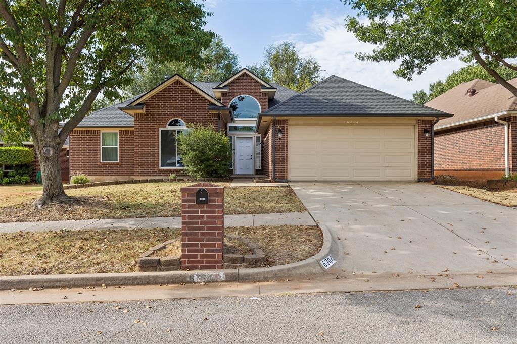 Fall in love with this 3-bedroom, 2-bath home in Westlake, featuring 2,082 square feet, a versatile upstairs loft, and a 2-car garage! With soaring ceilings, a statement brick fireplace, an updated kitchen and primary bath, plus a covered patio and fenced backyard, this home delivers personality, flexibility, and a location that keeps everyday conveniences close.Step inside to a dramatic living space where vaulted ceilings and an open loft above create an airy, unexpected layout. The brick fireplace anchors the room, while the open flow into the dining area makes entertaining feel effortless.Calling all kitchen lovers, there’s plenty of room to spread out! Generous counter space, stainless steel appliances, a farmhouse-style sink, and abundant cabinetry provide plenty of space for cooking, storage, and gathering.The primary suite offers a relaxing retreat with a beautifully updated bathroom featuring dual vanities, a soaking tub, separate shower, and walk-in closet. Two additional bedrooms are located on the main level, while the upstairs loft creates flexible space for a home office, game room, workout area, or second living space.Out back, enjoy a covered patio, fenced yard, and mature trees ready for weekend cookouts, pets, or evenings outside. Additional updates include 5 replaced windows, a roof replaced in 2020, and HVAC and water heater replaced in 2017.Located in the Deer Creek School District with quick access to the Turnpike, shopping, dining, and everyday conveniences. Be sure to explore the 3D walkthrough, video tour, and detailed floor plan!