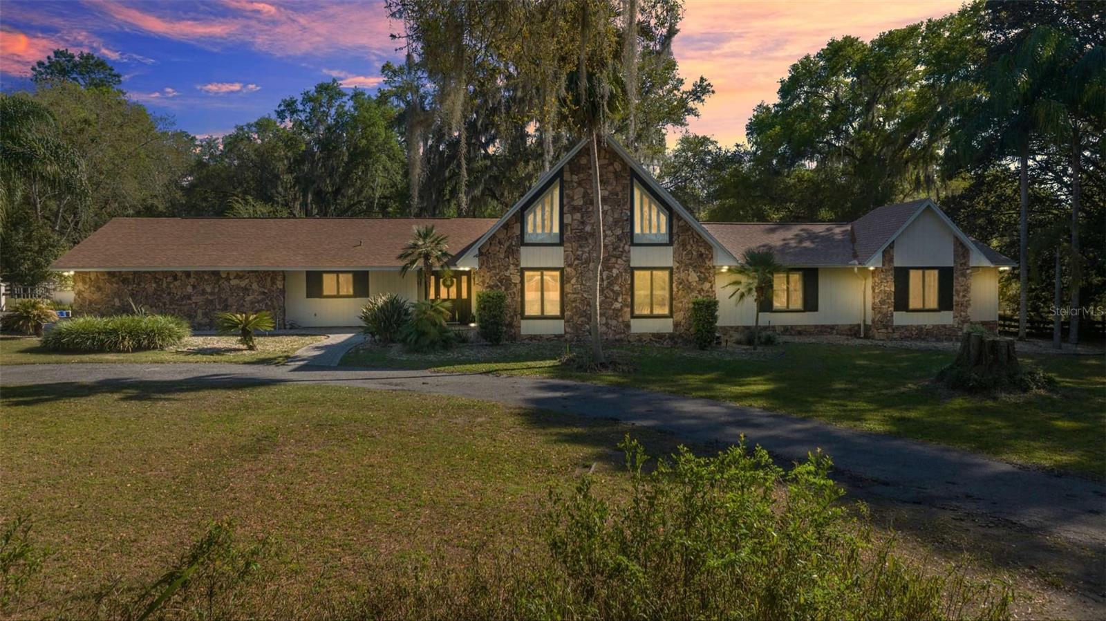 One or more photo(s) has been virtually staged. Welcome to this stunning 4,000+ sqft. home in the highly sought-after El Dorado subdivision, offering 5 bedrooms, 3 bathrooms, and a detached mother-in-law suite on 1.39 acres of beautifully fenced property. As you step inside, you'll be greeted by an expansive great room with high ceilings, skylights, and a design that fills the space with natural light. The home has been freshly repainted inside and out, with modern upgrades including upgraded appliances, new ceramic porcelain flooring in select areas, a repainted staircase with updated flooring, and a beautifully renovated master bedroom and bath. The kitchen boasts granite and quartz countertops, perfect for both everyday cooking and entertaining. Step outside to your own private retreat, featuring a covered lanai equipped with an outdoor kitchen, perfect for hosting gatherings or simply enjoying the serene surroundings. Additional updates include a newer HVAC system (2024), a newer roof, a 200-gallon owned gas tank, and a generator for added peace of mind. Ample storage space throughout the property ensures convenience, making this home as functional as it is beautiful. Book your appointment today and come see this incredible home for yourself