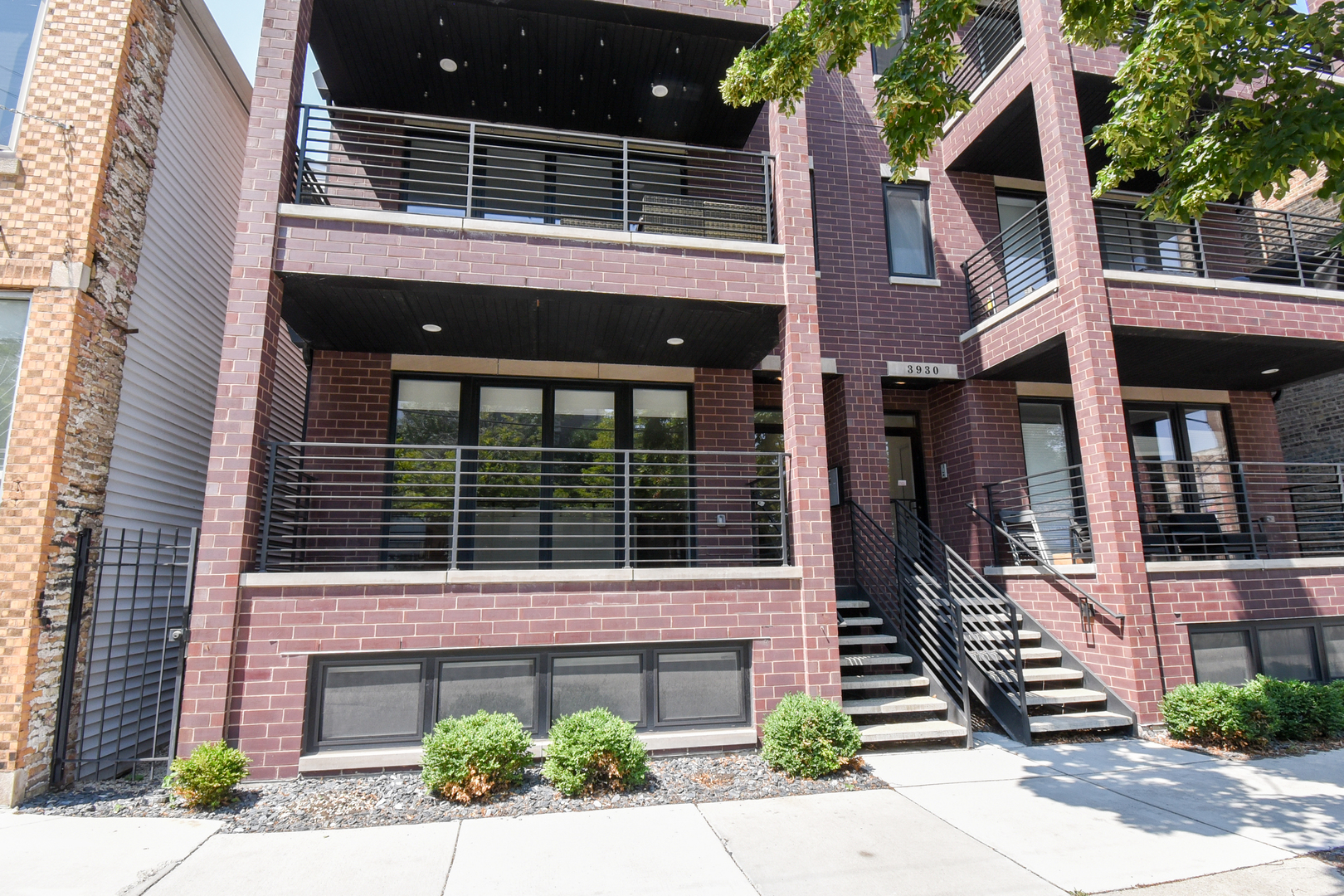 This stunning duplex feels like a single family home, with over 3,200 square feet of thoughtfully designed living.  All-brick unit with an extra-wide layout.  All bedrooms on the same level.  Primary bedroom with a walk-in closet, en suite bath with dual vanities, steam shower, soaking tub. Radiant heated floors throughout the lower level. Three decks including a spacious private rooftop deck. Massive great room with electric fireplace. Gorgeous quartz kitchen with Wolf, Bosch, and GE appliances.  EV ready garage parking spot. Top-rated Blaine School district and easy walk to the Brown line, parks, restaurants, and entertainment.