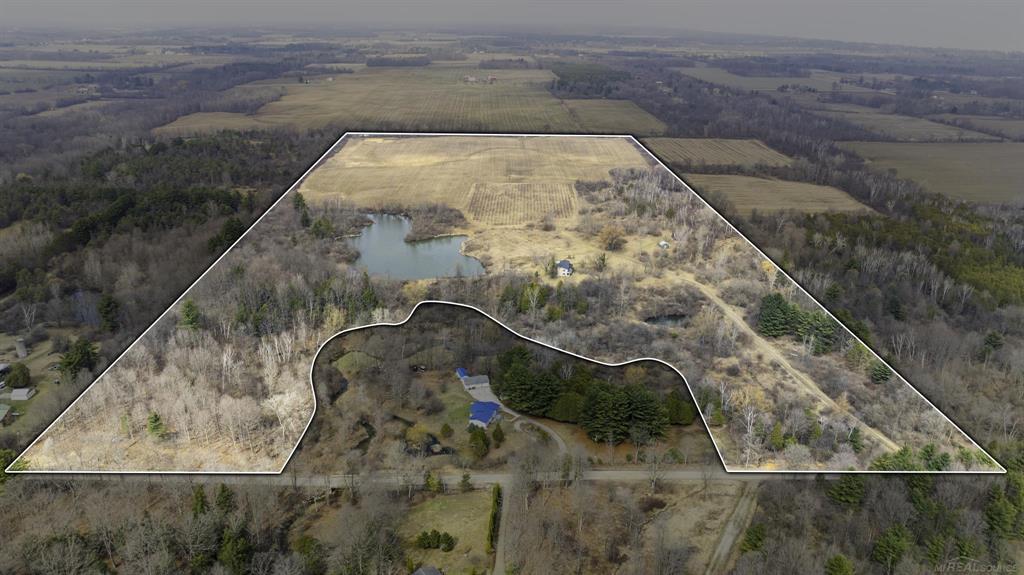STUNNING 74.89 Acre PARCEL @ 6471 Burns Line Road! A spectacular mix of tillable farmland, gorgeous woods & a large pond! A Hunter's Paradise & a Farmer's Dream - all just minutes from majestic Lake Huron! Zoned AGRICULTURAL! There is a large 4 Bedroom, 2350 Sq Ft Home on the property needing a complete renovation! Property also boasts a 20'x20' Equipment Outbuilding & a Hay Barn! Parcels of this size are a rare find!