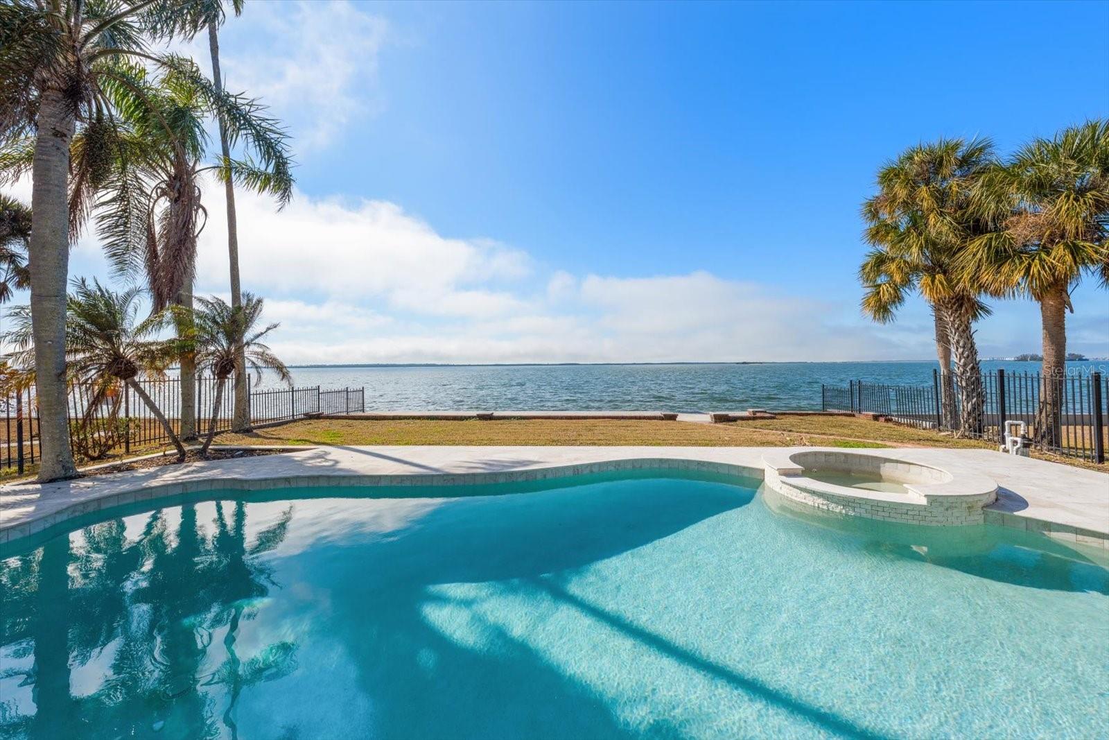 A rare opportunity to own a premier Dunedin homesite has arrived!  Seize the chance to build your dream home on this prime 74-foot waterfront lot overlooking the beautiful Intracoastal Waterway. Located on the iconic brick streets of Dunedin, lined with majestic Washingtonian Palms, this homesite offers unparalleled scenic views and tranquil living.  Enjoy peace of mind with a recently replaced seawall (2021) and the convenience of being just two blocks from the Pinellas Walk/Bike Trail. Imagine driving your golf cart to the vibrant Downtown Dunedin, where you can indulge in exceptional dining, libations, shopping, and lively festivals.  Relish stunning sunsets, abundant seabirds, and marine life right outside your door. Perfect for boating or kayaking, you can easily access Caladesi and Honeymoon Islands, renowned for their miles of pristine white sandy beaches. These lots are rarely available—a fantastic opportunity to build your coastal retreat in a community rich in history, warmth, and seaside charm. Embrace the Dunedin lifestyle and create your own private paradise!-- This home was impacted by Hurricane Helene and is being sold for the land only --