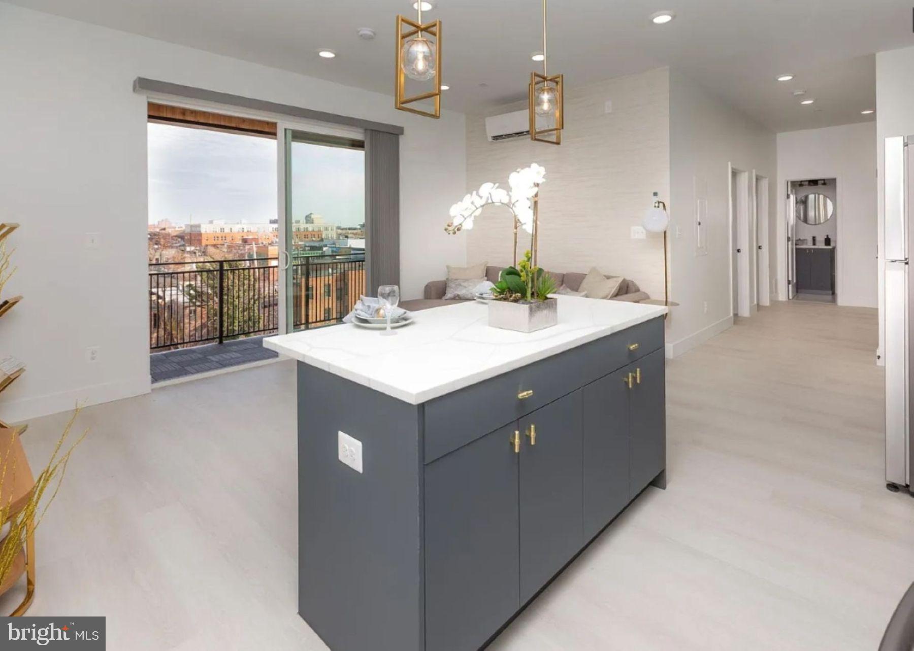 Discover your ideal apartment in The Caroline, where luxury living meets historic charm in the heart of Fells Point. Nestled in this picturesque neighborhood, our stunning apartments offer a refined living experience.Built in 2021, these new apartments step into open floor plans with soaring ceilings, creating an airy, welcoming ambiance that's flooded with natural light. Your gourmet kitchen, adorned with sleek stainless-steel appliances and black matte hardware, will inspire your inner chef. The custom walk-in closets, quartz countertops, engineered hardwood flooring, Philip Jeffries wallpaper, and posh lighting add more than a touch of opulence to your everyday routine as shown in the model home photos.Welcome to Fells Point, where charming cobblestone streets meet the waterfront. This pedestrian-friendly neighborhood boasts an array of bars, top-rated restaurants, and boutique stores. It's also home to one of Baltimore's most luxurious hotels, The Pendry. Explore historic streets, savor a lively culinary scene, and immerse yourself in the rich history and vibrant culture of this unique Baltimore neighborhood. Your oasis at The Caroline awaits, and we are ready to help you find your dream apartment!