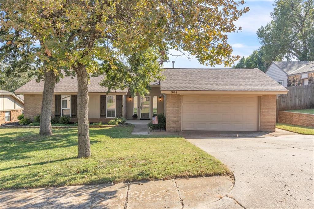 Welcome to this beautifully maintained 3-bedroom, 2-bath home nestled on a cul-de-sac in a prime southeast Edmond location. The curb appeal of the home invites you in with its mature trees and large front entrance. Once inside, you're welcome by the large living room, featuring built in shelving and a stone fireplace. Off the living room, you have the dining and kitchen area. The kitchen has plenty of space on the granite counters, lots of cabinets, and a new (2025) KitchenAid double oven, making it a chef's dream! Off the kitchen and living room are the French doors to the sunroom, providing a perfect place to sit and relax or to use as a home office. The large primary bedroom gives lots of space for rest, and the updated en suite is just right for unwinding. The two secondary bedrooms are large with good sized closets. You will love all of the built in storage in the hall. Outside, there is a patio for entertaining and a large shed for storage. Other things that make this home great: roof (2019), hot water tank (2021), HVAC (2019), in garage storm shelter, location close to lots of parks (Ted Anderson: 1 mile away), restaurants, and award winning school system.