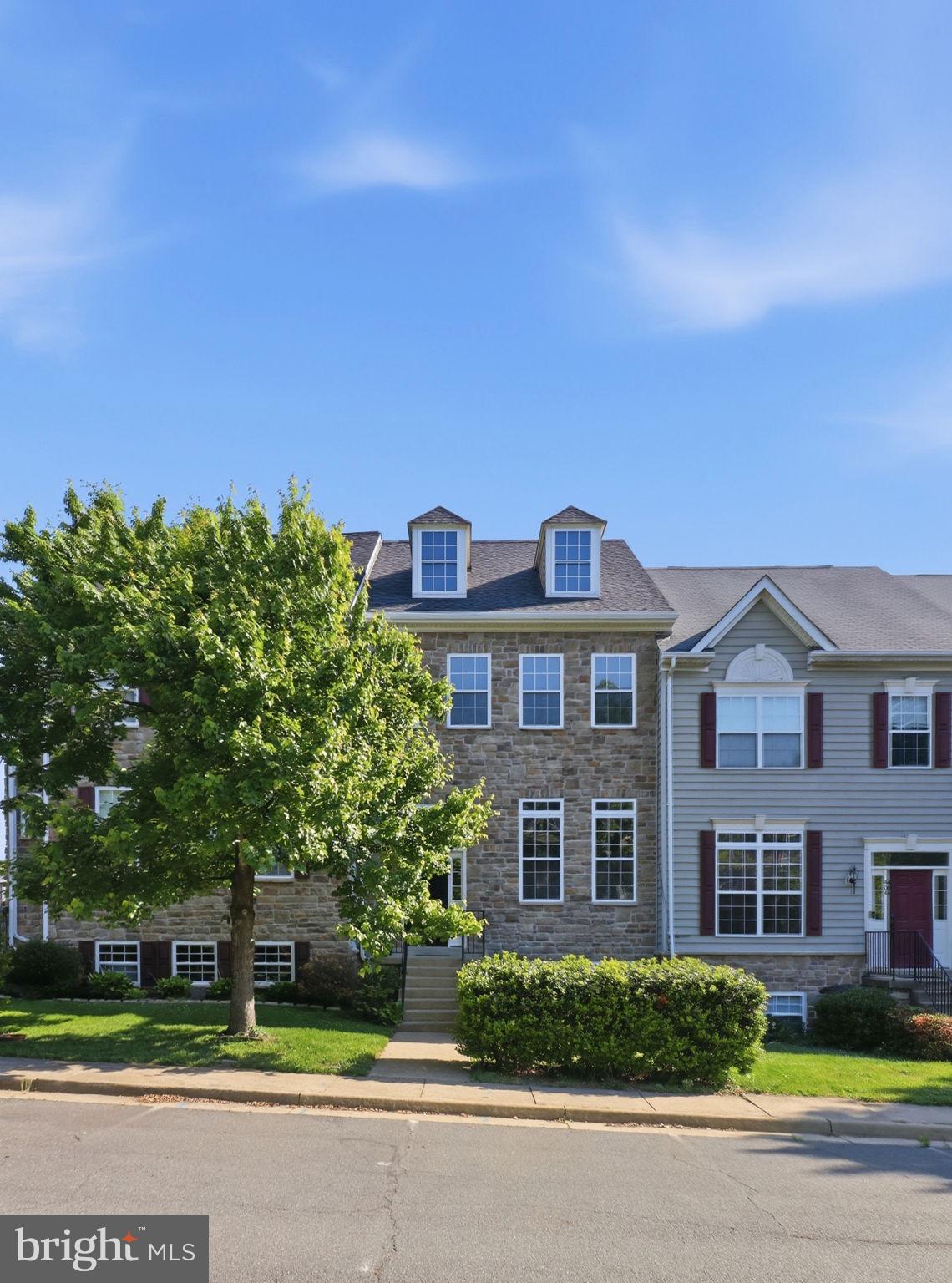 Spacious , open and bright, describes this home's feel! Gleaming wood flooring give the main level a clean, contemporary look.  The bedrooms are generously sized and the master bedroom even has a cathedral ceiling.  The main level has 9 and 11 foot ceilings. This townhome really feels like a single family home.  The lower level den, is the closest to a 4th bedroom that you could find. It has two good sized windows and a large closet. The tile floors in the basement are great for keeping things clean and provides a spacious feel in this bright walk-out basement. There is a stone patio just outside of the French doors, which both open for great furniture move into the basement recreation/family room area. It is such a bonus to have a 3rd full bathroom in the basement too! This beautiful townhouse is such a blessing!  Wake up in the morning to a natural backdrop of evergreen trees, sip a cup of coffee in the morning to a natural backdrop of evergreen trees,  on the back deck. Look out at the breathtaking colors of the sky, while the sun rises and listening to the birds chirping, to prepare what the day is to bring! Just behind this quiet and friendly neighborhood, amazingly, is such close proximity to some of the community's favorite restaurants, such as Monk's and Magnolia's. There are other necessity businesses, such as, Southern States Hardware and grocery stores. It is like being close to everything and yet the peaceful environment, makes it feel so far removed. It is the best of both worlds!