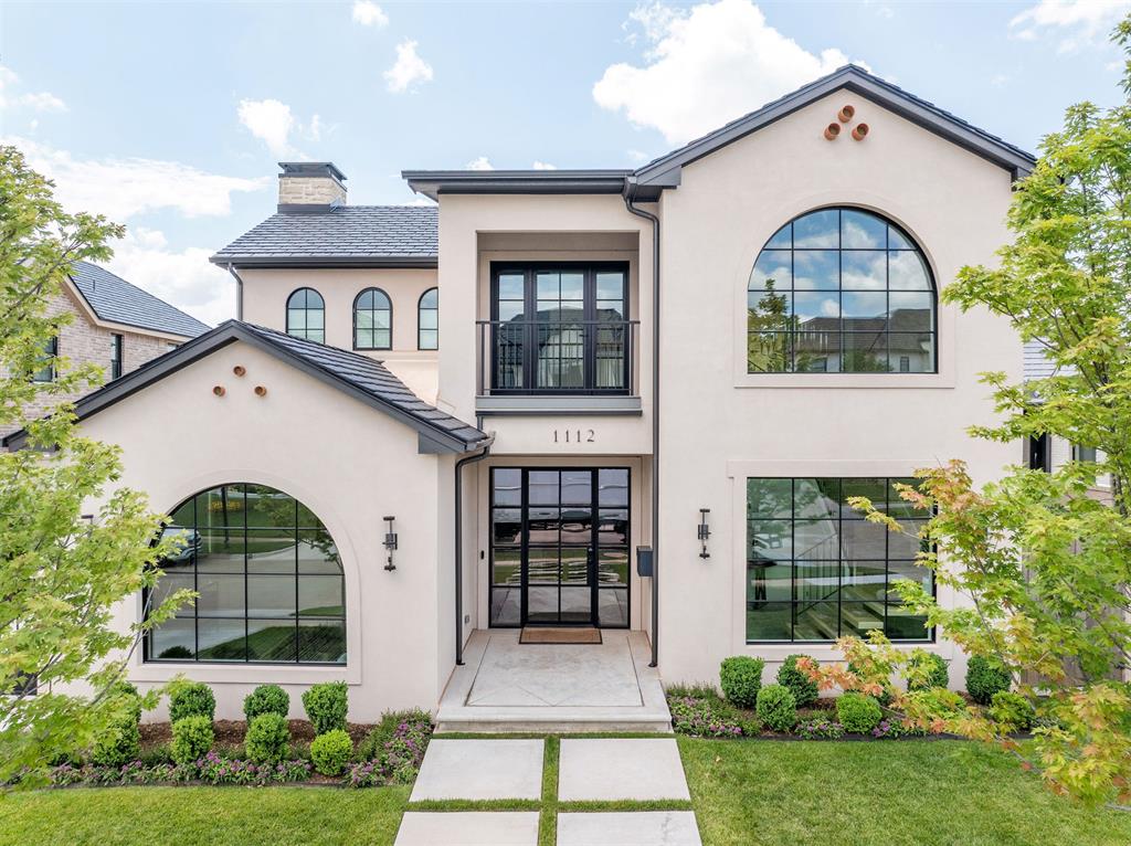Set within the exclusive enclave of Cumberland Court, this residence offers a combination of sophistication, curated interiors, exceptional design, & effortless luxury. Designed for both everyday living & elevated entertaining, the 4-bedroom, 4.5-bath home features a dedicated office w/ flexibility as a 5th bedroom, expansive living spaces, & thoughtful details throughout. A defining advantage of Cumberland Court is its elevated level of service. Residents enjoy access to a concierge service designed to simplify daily life, assisting with lawn care, handyman services, routine property needs, & day-to-day tasks. The main level features an open-concept living space, beautifully appointed kitchen and dining area, office & a private primary suite. The primary retreat offers a large walk-in closet & luxurious bath w/ oversized shower, dual vanities, & a private safe room within the closet. Upstairs, 3 generously sized bedrooms each feature ensuite baths, while a dedicated 2nd living space provides an ideal setting for movie nights & entertaining. The kitchen is a true centerpiece w/ custom cabinetry & quartz surfaces, an oversized island w/ abundant storage, & high-end appliances. Custom lighting, designer wallpaper, elegant drapery & refined finishes are found throughout. Multiple fireplaces, oversized windows, a dramatic 20-foot entry, & open staircase create a warm yet impressive atmosphere. Outdoor living is equally exceptional, featuring a private covered patio w/ outdoor fireplace, plus custom outdoor shades for added comfort & privacy. Additional outdoor spaces extend the home’s entertaining capabilities. A spacious 3-car garage provides ample room for vehicles & storage. Perfectly located moments from Nichols Hills Plaza, Whole Foods, & Classen Curve. Cumberland Court offers a rare combination of privacy, luxury, convenience, & service. This is more than a residence—it is a lifestyle designed to let you enjoy the home without the everyday maintenance.