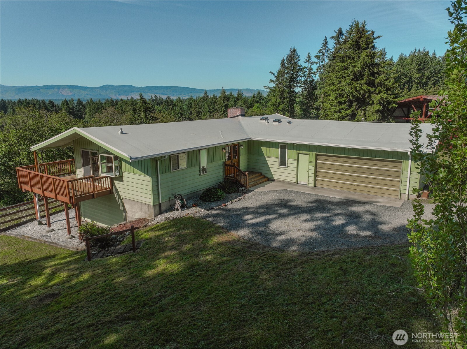 First Time on the Market! Breathtaking views of Mt. Rainier and the Cascades and a peek a boo view of Harts Lake. This timeless treasure has been lovingly cared for by generations and is ready for its next chapter. Nestled on 1 acre, this 3,000+ sq. ft. home offers 4 bedrooms plus bonus rooms, providing flexible space for multi-generational living, home offices, hobbies, or guests. The primary suite and an additional bedroom is conveniently located on the main floor. You'll love the spacious kitchen with double oven. The quarter wrap around deck is perfectly placed to relax and enjoy the views. Recent updates include a new roof, new gutters, and a newly poured concrete garage floor, apron and landing. The fully fenced and gated property features a beautiful pasture, offering room for animals, gardening, or simply enjoying the peaceful country setting. A rare opportunity to own a truly special property where pride of ownership shines throughout.