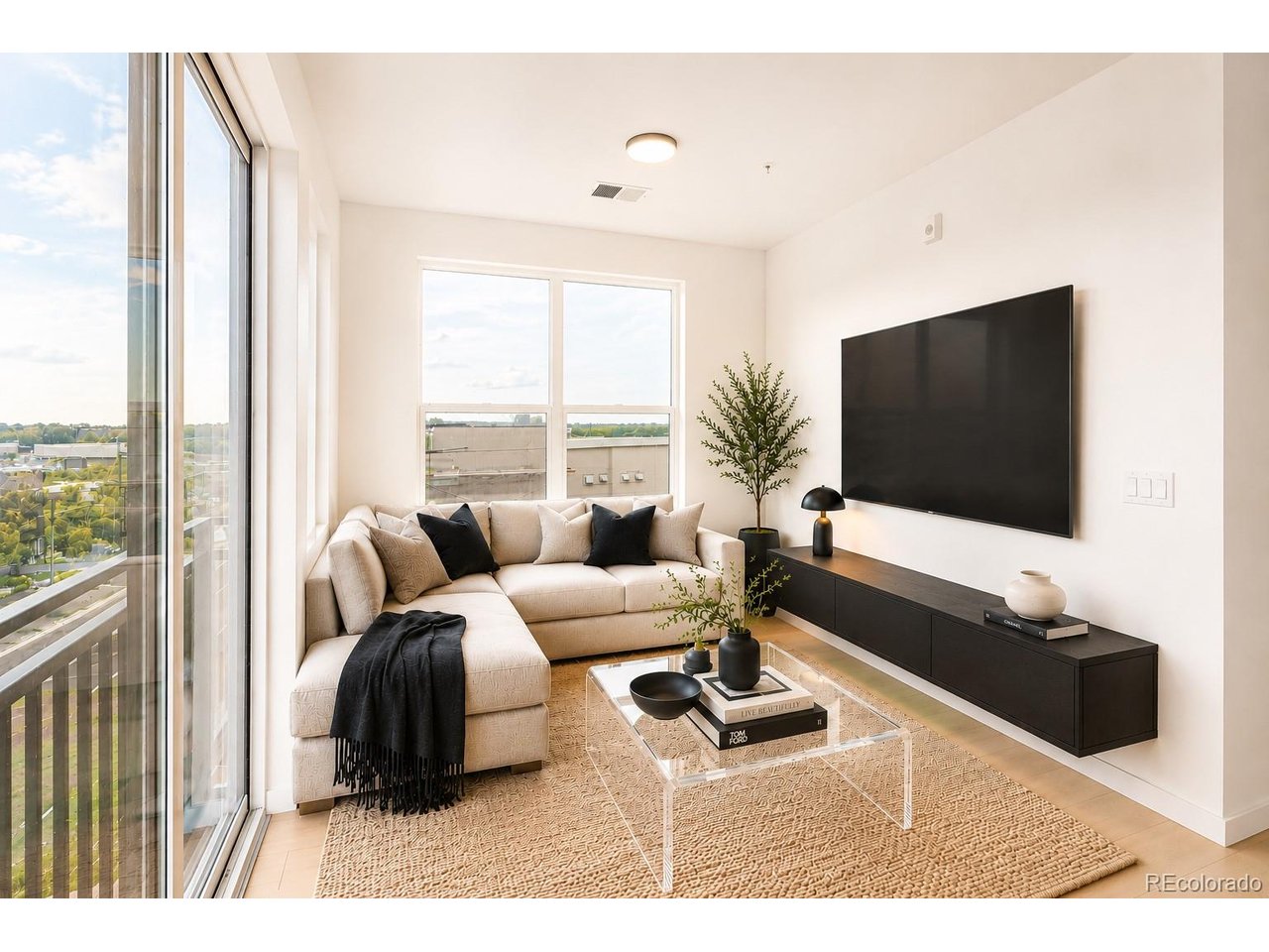 Dreaming of living in one of  Denver's hottest neighborhoods, Sloan's Lake, but thought you were priced out? Here's your chance to finally own a piece of the action. This brand-new condo community is designed especially for people who want to be in the center of one of Denver's most vibrant neighborhoods. This stylish 1-bedroom, 1-bath residence packs a punch. Warm, light wood luxury plank flooring throughout, gorgeous on trend warm wood cabinetry, stainless steel appliances and quartz countertops are something to look forward coming home to!  The bright, crisp full sized bath features a large walk in shower, wide vanity, and stylish lighted mirror. In unit, full sized washer & dryer hookups.  Bring the crisp Colorado air indoors with a Juliet balcony & sliding glass door.Because this isn't just about square footage. It's about location.Ideally located right at the corner of Sloan's Lake, all the best restaurants, entertainment and nightlife are right at your fingertips. Bike around the lake, do yoga at the park, walk to local hotspots, catch concerts downtown, or head west for a mountain weekend - all without giving up the convenience of city living.And instead of paying someone else's mortgage in rent, this is your opportunity to actually own in a neighborhood that continues to grow, evolve, and attract some of Denver's best dining, recreation, and lifestyle amenities. The Denver lifestyle you've been chasing? It's finally within reach.