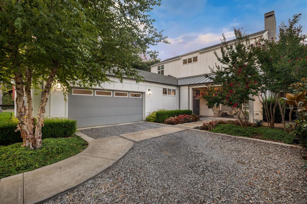 Welcome to your dream home in desirable Little Forest Hills, less than 1 mile from White Rock Lake and surrounded by endless outdoor recreation. This modern farmhouse blends timeless charm with contemporary design on an oversized, gated lot offering exceptional privacy.Step inside to a bright, open floor plan filled with natural light, 10-foot ceilings, polished concrete floors, art lighting, and a cozy fireplace. The chef’s kitchen features quartz countertops, European-style cabinetry, stainless steel appliances, and a gas range—perfect for entertaining or everyday living.The primary suite on the main level is a peaceful retreat with sliding glass doors opening to the backyard and a luxurious ensuite bath complete with soaking tub, walk-in shower, and dual vanities. A second downstairs bedroom also includes a private ensuite.Upstairs, you’ll find two spacious bedrooms with a Jack-and-Jill bath, plus a study area and flex room—ideal for a home office, gym, or playroom. The large backyard offers plenty of space for outdoor entertaining and even a future pool.This home perfectly balances style, comfort, and functionality in one of East Dallas’s most sought-after neighborhoods.