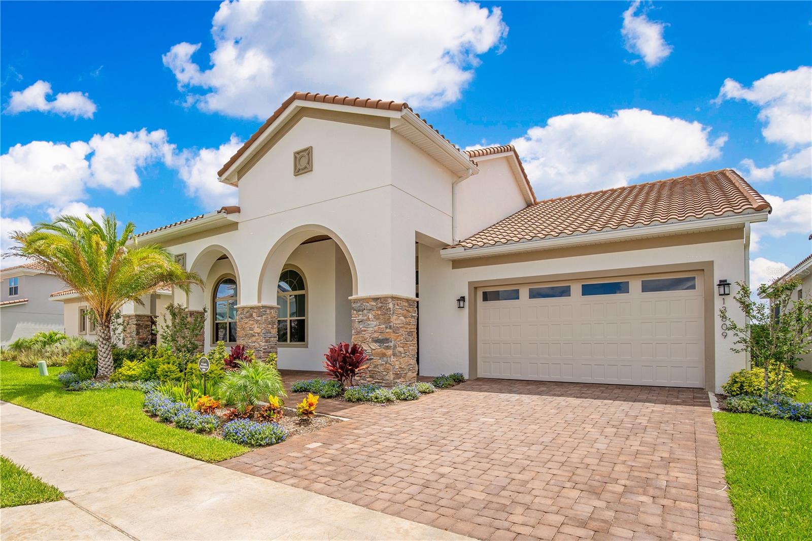 Luxury, privacy, and space, all in the heart of Lake Nona! Welcome to 13809 Abberwick Dr, a stunning Innisbrook II model by Jones Homes, built in 2023 and located in the highly sought-after Eagle Creek gated golf community. This expansive home offers 5 bedrooms, 5 full bathrooms, and over 4,453 heated square feet of living space, thoughtfully designed with high-end upgrades throughout.

Set on nearly ¼ acre with no rear neighbors and a peaceful canal view, this is a rare opportunity for privacy in a newly built home. Inside, you'll find an open-concept layout featuring a chef’s kitchen with an oversized island, elegant finishes, and seamless indoor-outdoor living. The first floor includes generous living and dining areas plus a luxurious owner’s suite with spa bath and walk-in closet.

The second floor offers multiple bonus spaces, including a theater room, flex room, and a spacious covered balcony, perfect for entertaining, relaxing, or working from home.

Located in Eagle Creek, enjoy resort-style amenities including a clubhouse, pool, fitness center, tennis courts, playgrounds, and top-rated schools, just minutes from Lake Nona Town Center, Boxi Park, restaurants, Orlando International Airport, and major medical hubs.

?? A rare blend of space, upgrades, and location, schedule your private showing today!