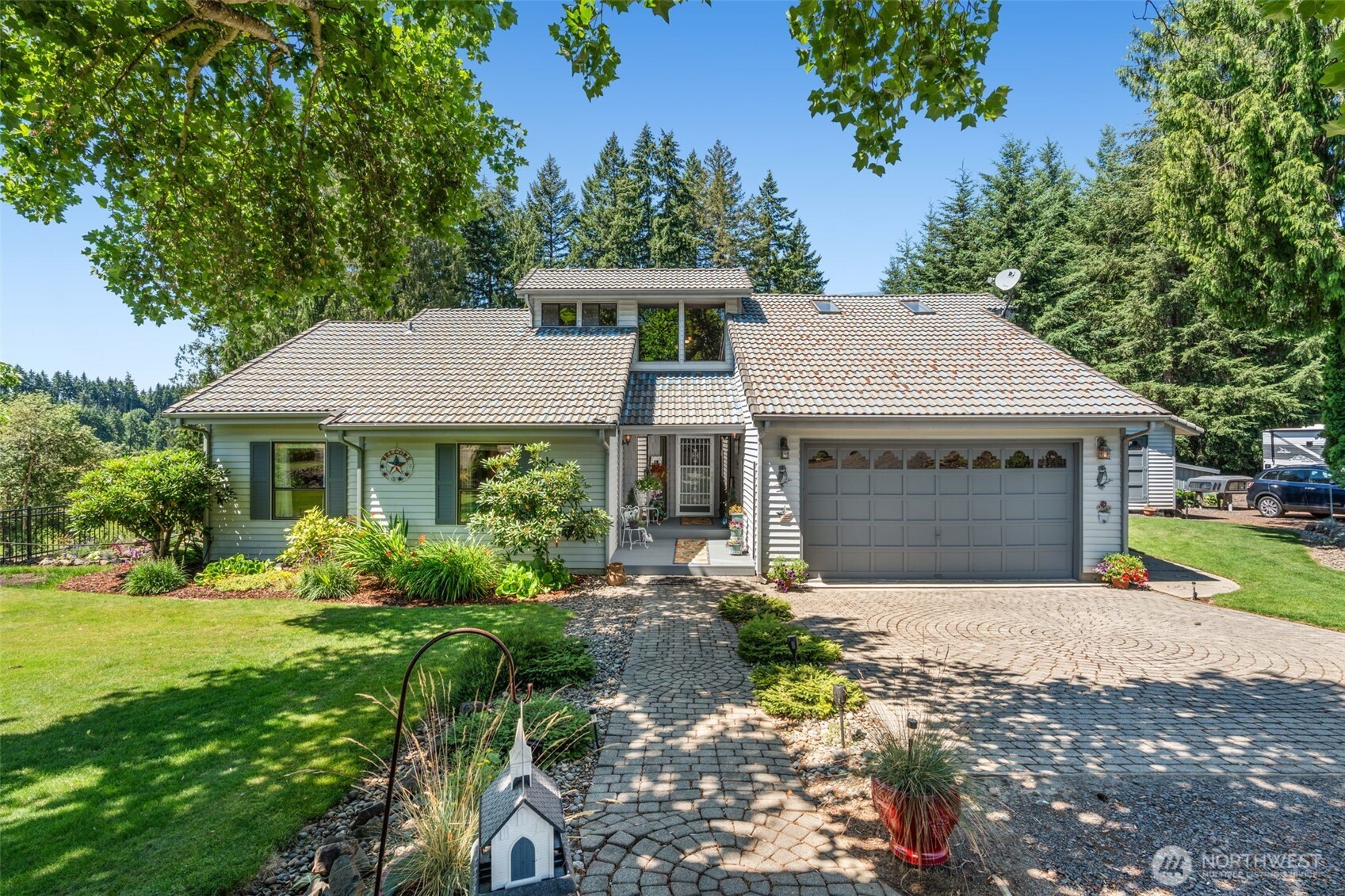 Exceptional Adna property offering breathtaking views, two primary en suites, multiple living spaces, a loft, and a beautifully remodeled open kitchen with adjoining dining area designed for entertaining. Outside, enjoy meticulously landscaped grounds with garden space, fruit trees, and a sprinkler system. The private pond is perfect for swimming and fishing and features a dock with slide, while the regulation sand volleyball court and horseshoe area create an incredible setting for recreation and gatherings. Thoughtfully designed for year-round enjoyment, the home includes a wood stove that provides cozy warmth, generator-ready wiring for added peace of mind, and sits on land that has historically remained high and dry during seasonal flooding in surrounding areas. Built by the original owners, this one-owner home reflects exceptional pride of ownership, with photos documenting the home’s construction from the ground up. A rare opportunity to own a truly special property offering comfort, quality, privacy, and an unmatched lifestyle.