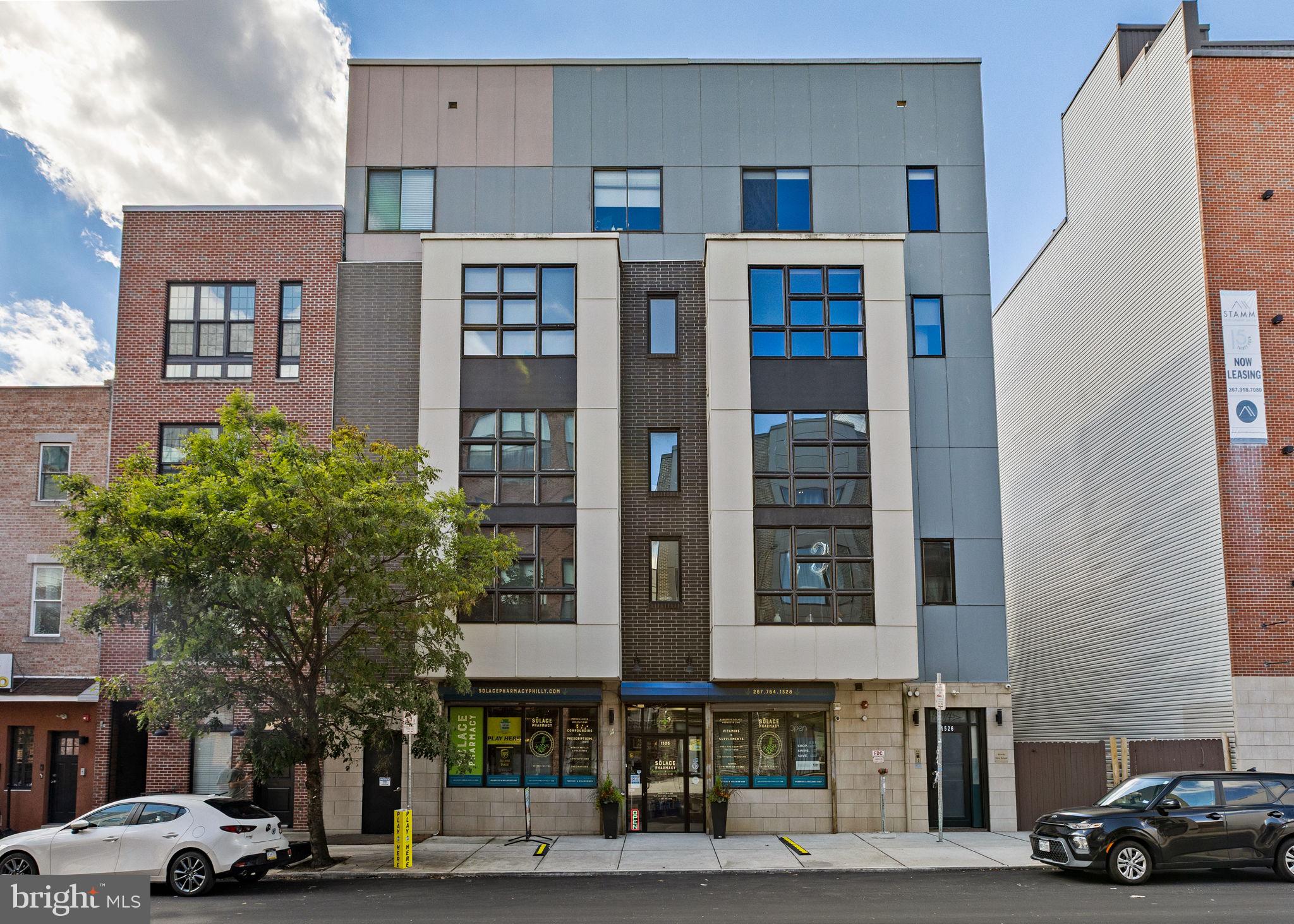 Spacious, modern, and filled with natural light, this bi-level Francisville condo offers 2 bedrooms, 2.5 baths, and a large private roof deck with gorgeous Philadelphia skyline views! This eight-unit boutique condo building has a secure entrance and an elevator for your convenience.The open floor plan with floor to ceiling windows creates an inviting space for everyday living and entertaining, while the contemporary kitchen features stainless steel appliances, generous counter space, a center island, and plenty of cabinetry.Both bedrooms feature soaring ceilings, and the primary has a huge walk-in closet. Great storage throughout, central air, in-unit laundry, and recessed lighting add to the comfort and convenience.Enjoy a neighborhood filled with restaurants, coffee shops, and green spaces. Local favorites include Bar Hygge, Vineyards Cafe, Urban Saloon, and Libertee Grounds. The brand-new Lost Time Brewing, right across the street, is holding its grand opening on October 16th! Francisville Playground, Ogden Park, and The Spring Gardens are nearby, along with The Met Philadelphia, and Eastern State Penitentiary. The Philadelphia Museum of Art and Schuylkill River Trail are also within easy reach.With convenient access to Fairmount and Ridge Avenues, the Broad Street Line, bus routes, and I-676, getting around is easy. A quick 5 min subway ride, or 20 minute walk and you're in Center City!Plus, approximately two years remain on the tax abatement!Don’t miss your chance to call this condo home and enjoy everything Francisville has to offer!