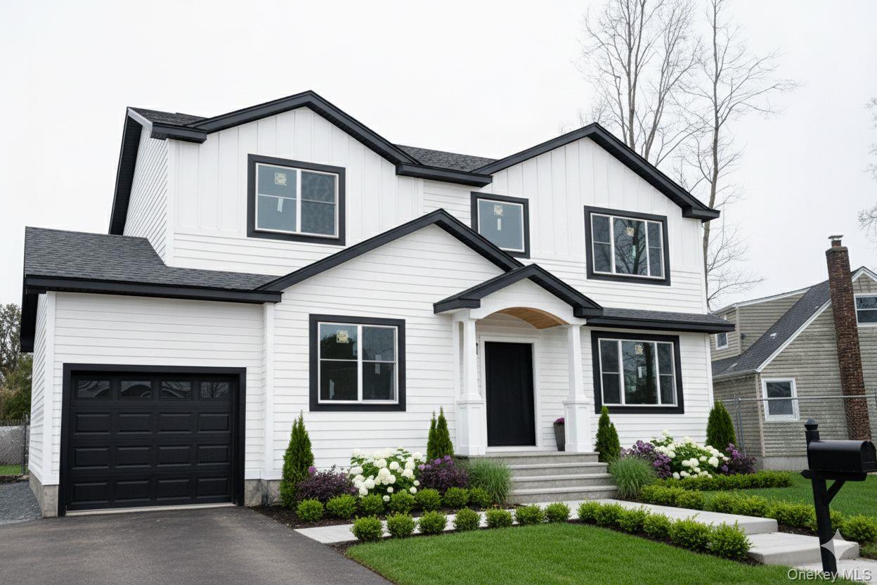 Welcome to this beautifully crafted newly renovated residence in the heart of Plainview, ideally situated on a 60×100 lot close to major shopping, dining, and transportation. Thoughtfully designed and built with high-end finishes throughout, this home delivers modern luxury with smart long-term value.Offering 5 spacious bedrooms and 3.5 designer baths, the home features an open-concept layout, elegant architectural details, and a seamless flow for both everyday living and entertaining. The chef’s kitchen and living spaces are complemented by premium materials and upscale craftsmanship at every turn.The home includes a full basement with excellent ceiling height, providing flexible space for storage, recreation, or future customization. While the residence has been completely rebuilt with brand-new construction above grade.Additional highlights include a one-car garage, modern systems, and a prime location just minutes from Plainview’s central shopping corridors. A rare opportunity to own a turnkey, luxury home with low taxes in one of Nassau County’s most desirable neighborhoods.