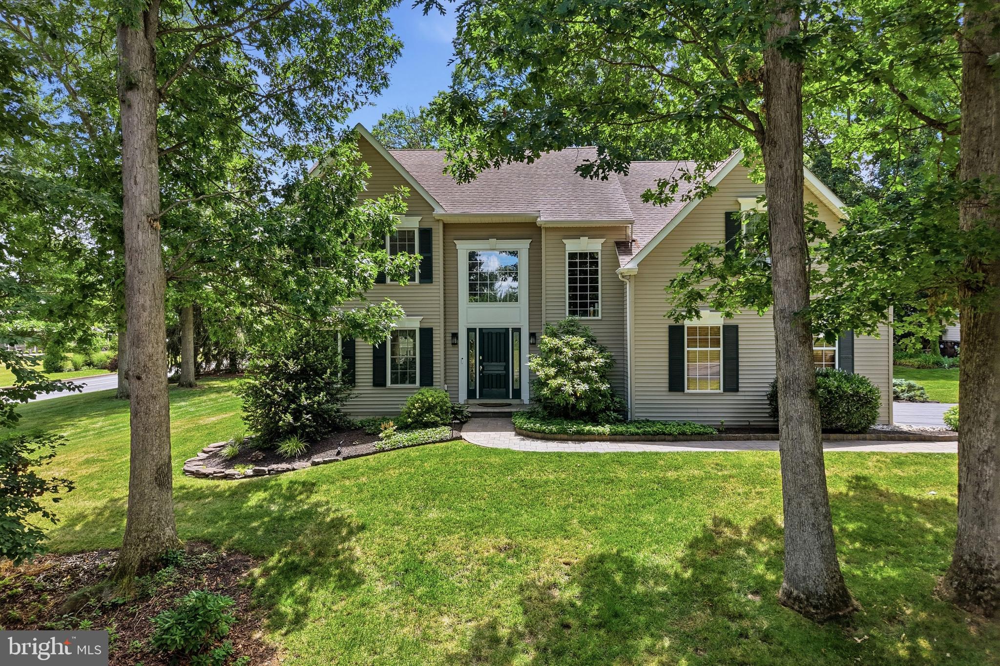 Welcome to 350 Oak Ridge Lane, an exceptionally well-maintained 4-bedroom, 2.5-bath Colonial set on a beautifully landscaped lot in the desirable Harleysville community and sought-after Souderton Area School District. Offering a wonderful combination of timeless architecture, generous living spaces, thoughtful improvements and inviting outdoor areas, this is a home that has clearly been cared for with pride.A dramatic two-story foyer creates an impressive first impression, complemented by hardwood flooring, abundant natural light and classic architectural details. The gracious formal living and dining rooms provide plenty of space for entertaining, with the dining room enhanced by crown molding and chair rail.At the heart of the home is the remodeled kitchen,designed for both everyday living and entertaining. Beautiful cabinetry, granite countertops, stainless steel appliances, glass tile backsplash, abundant workspace and storage surround a large custom center island with abundant seating. The kitchen flows naturally into the spacious family room, where a striking stone wood-burning fireplace creates a warm and welcoming focal point. A sliding glass door provides an effortless transition to the outdoor living space.Step outside to the expansive composite deck, overlooking the home's immaculately maintained landscaping. Whether hosting summer gatherings, dining outdoors or simply unwinding at the end of the day, this private outdoor setting is ready to be enjoyed. Paver walkways, established gardens and a charming storage shed further enhance the property.Upstairs, the spacious, upscale primary suite offers a relaxing retreat with a large sitting area, two closets—including a walk-in—and a private en-suite bath featuring a vaulted ceiling and skylight. The bath was updated in 2020 with a new shower, toilet, & more. Three additional generously sized bedrooms share an upgraded hall bath, renovated in 2019 with a double vanity and tiled finishes. Your stairwell with landing features a beautiful plush runner and gorgeous hardwood floors round out the upstairs hallway. The finished basement, provides approximately 600 additional square feet of versatile living space, ideal for a recreation room, home office, fitness area or media space, while still retaining valuable storage.Additional improvements reflect years of attentive ownership, including replacement windows throughout, replacement front door and sidelights, replacement garage doors, an updated kitchen sliding door, ceramic tile flooring in the laundry and powder rooms, a new roof in 2016, re-stuccoed chimney in 2020 and new exterior lighting in 2025. An attached two-car garage completes the package.All of this is located on a corner lot within walking distance of Oak Ridge Elementary School and just minutes from the restaurants, shopping, parks and attractions of Harleysville, Skippack and Souderton. Convenient access to the Pennsylvania Turnpike's Northeast Extension and Route 309 makes commuting throughout the region easy.Beautifully maintained, thoughtfully updated and wonderfully situated, 350 Oak Ridge Lane offers the space, comfort and setting to feel like home from the moment you arrive.