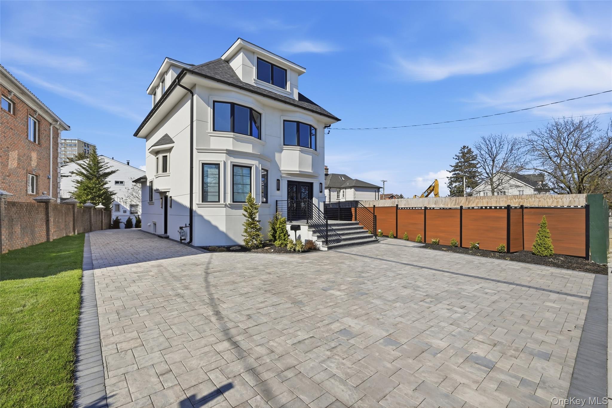 This Meticulously Renovated from top to down house is located in the prestigious Bay Terrace neighborhood of Bayside, a prime location! Top 26th School Districts . The beautiful home is like a work of art, with a highly logical and well-planned structure. The interior features ultra-modern, refined materials, and the craftsmanship is exceptional. The space is expansive and bright, offering 5 Bedrooms, 4 1/2 Bathrooms, High-end, custom-designed kitchen with a premium High-end appliances, All bathrooms are outfitted with imported, high-end tiles and are complemented by luxury bathroom vanities High quality of Hardwood Floor through out! The entire layout and design flow seamlessly, showcasing an exceptional balance of beauty and quality. This house is your dream home, with beautiful landscaping, excellent design, and a perfect finish throughout. A MUST-SEE!