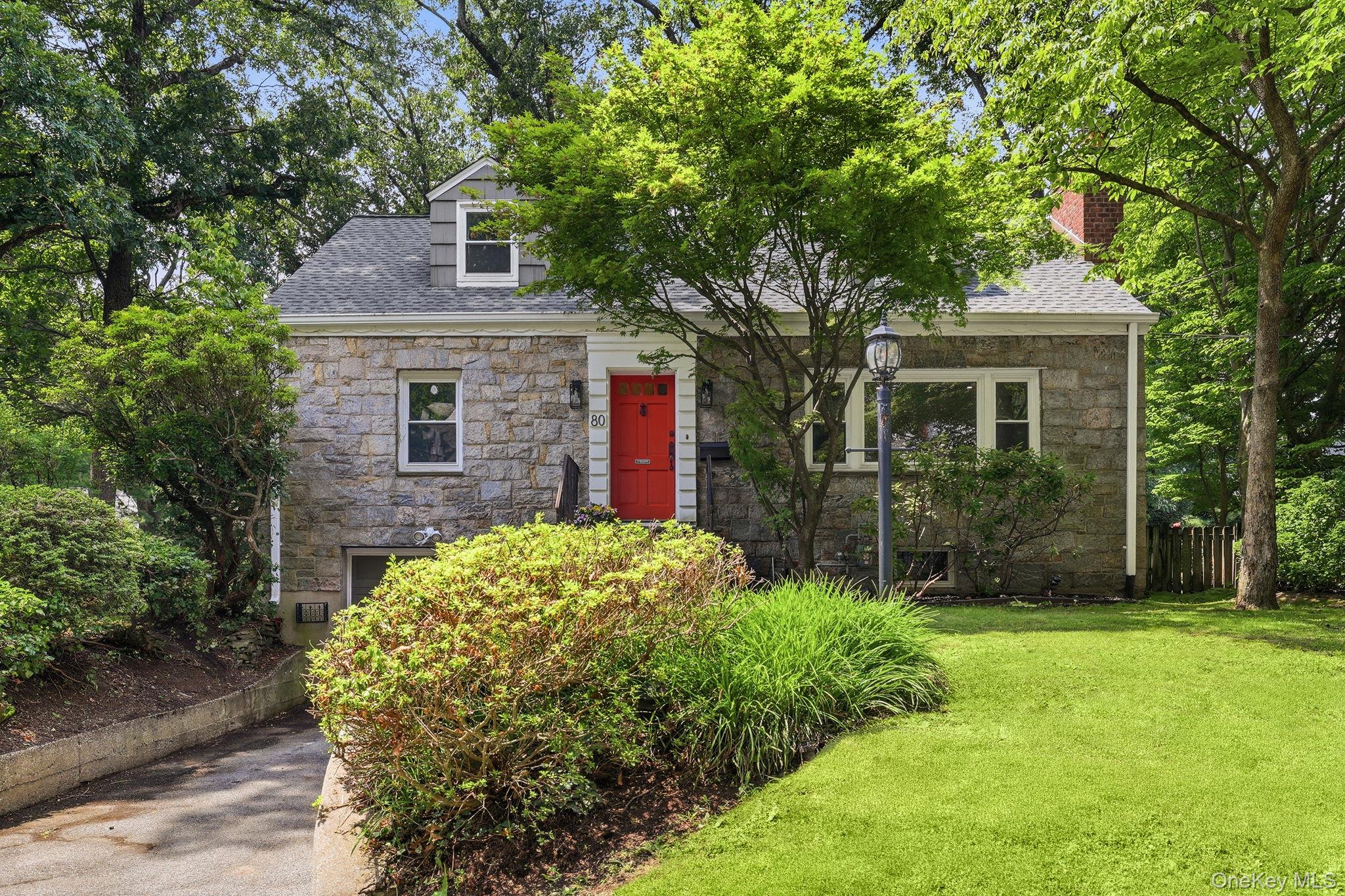Welcome to this charming, move-in ready home in the highly sought-after Manor Woods neighborhood of Hartsdale. This classic Cape offers four bedrooms, two full baths and is situated on a level .14-acre property. This well-maintained home combines classic charm with everyday comfort. The spacious living room, highlighted by a wood-burning fireplace, creates a warm and inviting space for relaxing or entertaining. The layout seamlessly flows from the dining room into the updated kitchen, which features granite countertops, stainless steel appliances, ample cabinetry, and plenty of storage. There are also 2 large bedrooms and a full bath on this level. On the second floor are 2 generously sized bedrooms and a full bath.  The property features a private, flat fenced backyard — perfect for throwing a ball or throwing parties. With its inviting curb appeal, thoughtful updates, and exceptional location, this home presents a wonderful opportunity in one of Hartsdale’s most desirable neighborhoods. Conveniently located just minutes from Metro-North, parks, shopping, restaurants, and major parkways, this home offers the perfect balance of suburban tranquility and modern convenience. Don’t miss the chance to own this gem!
