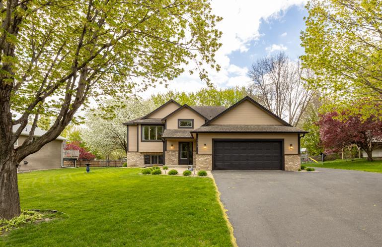 Discover the ease and comfort of everyday living in this spacious home in a high-demand school district of Lakeville. With two primary suites and a bonus garage/workshop, this home has some unique features that are hard to find. You are welcomed into a generous entryway that leads to an elevated living room with natural light and a cedar vaulted ceiling that creates a warm, welcoming atmosphere. From here, the main floor flows seamlessly into the bright kitchen with breakfast bar and informal dining, all anchored by the nice deck off of the formal dining room. Enjoy 3 bedrooms and two bathrooms on this level, including the primary suite with a private bath and two closets. The lower level has a cozy gas fireplace with extra room for relaxing and entertaining. There is a 2nd enormous primary bedroom suite in the lower level that includes a walk in closet and 3/4 bath, providing flexibility for guests, home offices, or growing households. The backyard is an oasis between the deck, the concrete patio, and the beautifully fenced yard with lots of room to play! If you have hobbies or need extra storage, there is an amazing bonus 28x31 garage. Located minutes from shopping, highway access, restaurants, and the airport. If location, comfort, and space are your priorities, then this home is worthy of your attention.