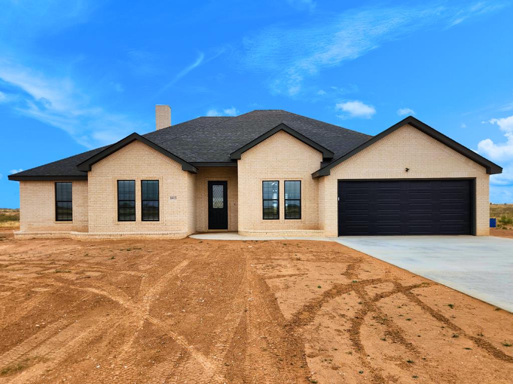 Spacious Greenwood home on 1.68 acres outside city limits with no HOA. Enjoy two inviting living areas, a formal dining room, and a bright kitchen with modern finishes. Custom built-ins and an electric fireplace add warmth to the living space. Jack and Jill bath connects two bedrooms. Private well produces about 13 to 15 gallons per minute. The wide open property provides room to enjoy your outdoor activities. Thoughtful layout for living and  entertaining. Buyer to verify all information.