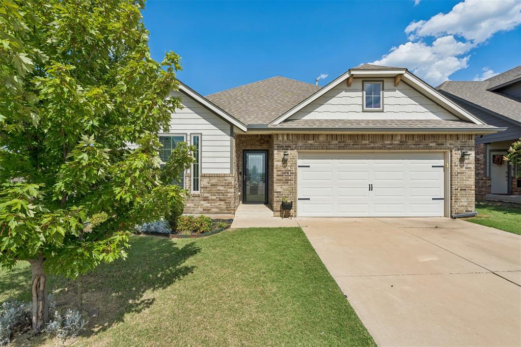 Absolutely inviting home nestled on a greenbelt lot in the desirable Deer Creek School District! Beautifully designed with an open-concept floor plan, fresh interior paint, and no carpet, this home offers the perfect blend of style, comfort, and functionality. From the moment you arrive, appreciate the curb appeal with neutral brick, modern gray accents, a mature shade tree, and lush landscaping. Govee Smart Home soffit lighting adds lighting that can be controlled from your phone, making holiday decorating easy. Step inside to the foyer where an elegant arch leads into the spacious living area. A gas fireplace with a white mantel creates a beautiful focal point, while expansive windows frame peaceful greenbelt views and fill the living and dining with abundant natural light. The kitchen is incredible with a massive island that anchors the space, complemented by white quartz countertops, white cabinetry, a walk-in pantry, and stainless steel appliances, providing plenty of room to cook, gather, and make lasting memories. Conveniently located off the garage, the laundry room offers functionality with built-in cabinetry and a hanging area for clothes. Two secondary bedrooms are situated at the front of the home and share a hall bath featuring an oversized vanity and tub/shower combo. Tucked away for added privacy, the primary suite serves as a relaxing retreat. The walk-in closet offers exceptional organization, while the ensuite bath features dual sinks, a jetted tub, and a stall shower. Step outside to your east facing covered patio and enjoy the sunrise with morning coffee and cool, shaded evenings overlooking the greenbelt. It's the perfect setting for grilling, entertaining, or simply unwinding. Modern conveniences abound with smart lighting throughout the home, a Nest thermostat, and a Ring doorbell already in place. Located just minutes from the Kilpatrick Turnpike, you'll enjoy quick access to shopping, dining, entertainment, and everything OKC offers!