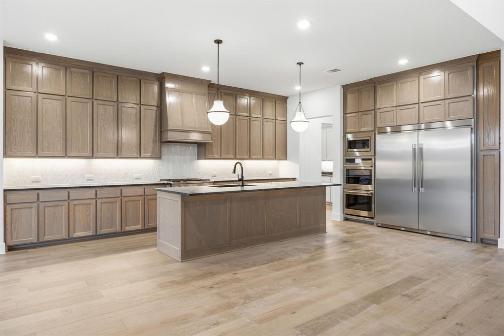 Spanning 3,840 square feet, this thoughtfully designed home offers four generously sized bedrooms, each with its own en-suite bathroom, ensuring comfort and privacy for every member of the household. A dedicated study provides a quiet space for work or creativity, while a large game room offers endless opportunities for entertainment and relaxation.  The open concept living area is designed with family gatherings and entertaining in mind, featuring a large kitchen with a functional morning kitchen and built in refrigerator and freezer that seamlessly flows into the dining and living spaces. Oversized windows invite natural light and offer stunning views of your private one-acre lot. The primary suite serves as a luxurious retreat, complete with a spa-inspired bathroom, free standing tub and an expansive walk-in closet.With a three-car garage and plenty of storage, the Clay floor plan blends practicality with luxury. Set on a generous half-acre lot in The Arbors at Lakewood Village, the Clay offers an oversized covered patio with outdoor fireplace to complement its expansive interiors.