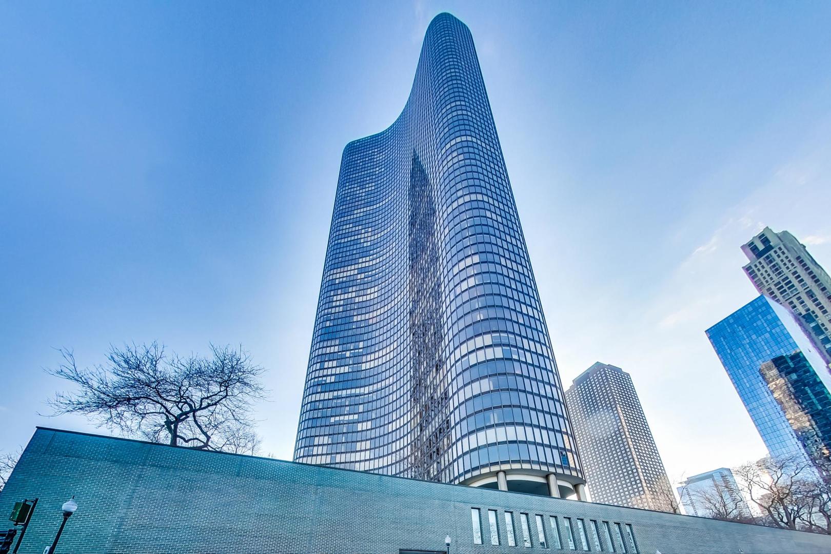 Spectacular Designer Residence with Panoramic Lake Views - Lake Point Tower, 51st Floor.   Experience luxury living in this stunning 3,000 sq. ft. showpiece residence perched high on the 51st floor of iconic Lake Point Tower-the only residential building east of Lake Shore Drive. With over 100 feet of floor-to-ceiling windows, this one-of-a-kind home offers uninterrupted, sweeping views of Lake Michigan from every angle.  Designed by renowned Italian architect Luca Lanzetti and featured in CS Interiors, this residence is a true masterpiece of contemporary design. The expansive layout includes 3 bedrooms, 3 full baths, a custom bar, oversized master suite with luxurious ensuite bath, and a full-size laundry room.    At the heart of the home, the award-winning "Silverbox" stainless steel kitchen is a sculptural work of art, seamlessly integrated with the living space. At the opposite end, a sleek Ernestomeda Barrique bar anchors the lounge area-perfect for entertaining.    Notable finishes and features include:    Flooring by Graniti Fiandre    Swirling metallic tile bathrooms and shimmering Bisazza glass mosaic columns in gold and red    Custom lighting by Artemide.   High-definition cable and high-speed internet included   Thoughtful storage and utility spaces throughout   Resort-Style Amenities at Lake Point Tower:  2.5-acre wooded park on the 3rd floor with pond, waterfall, and BBQ area  Indoor & outdoor swimming pools  Full fitness center, steam and sauna rooms  Racquetball, squash, pickleball, and basketball courts    Business center, conference room, library  Dry cleaners, micro-market, and salon  24/7 door staff and secure onsite storage     Prime Location:  Lakefront path just outside your door  Steps from CTA transportation, Navy Pier, Ohio Street Beach, and Michigan Avenue shopping & dining     A Rare Architectural Gem in the Sky  Sophisticated, striking, and designed for elevated city living-this extraordinary residence combines world-class design with unmatched lakefront views and the very best of Chicago's urban lifestyle.