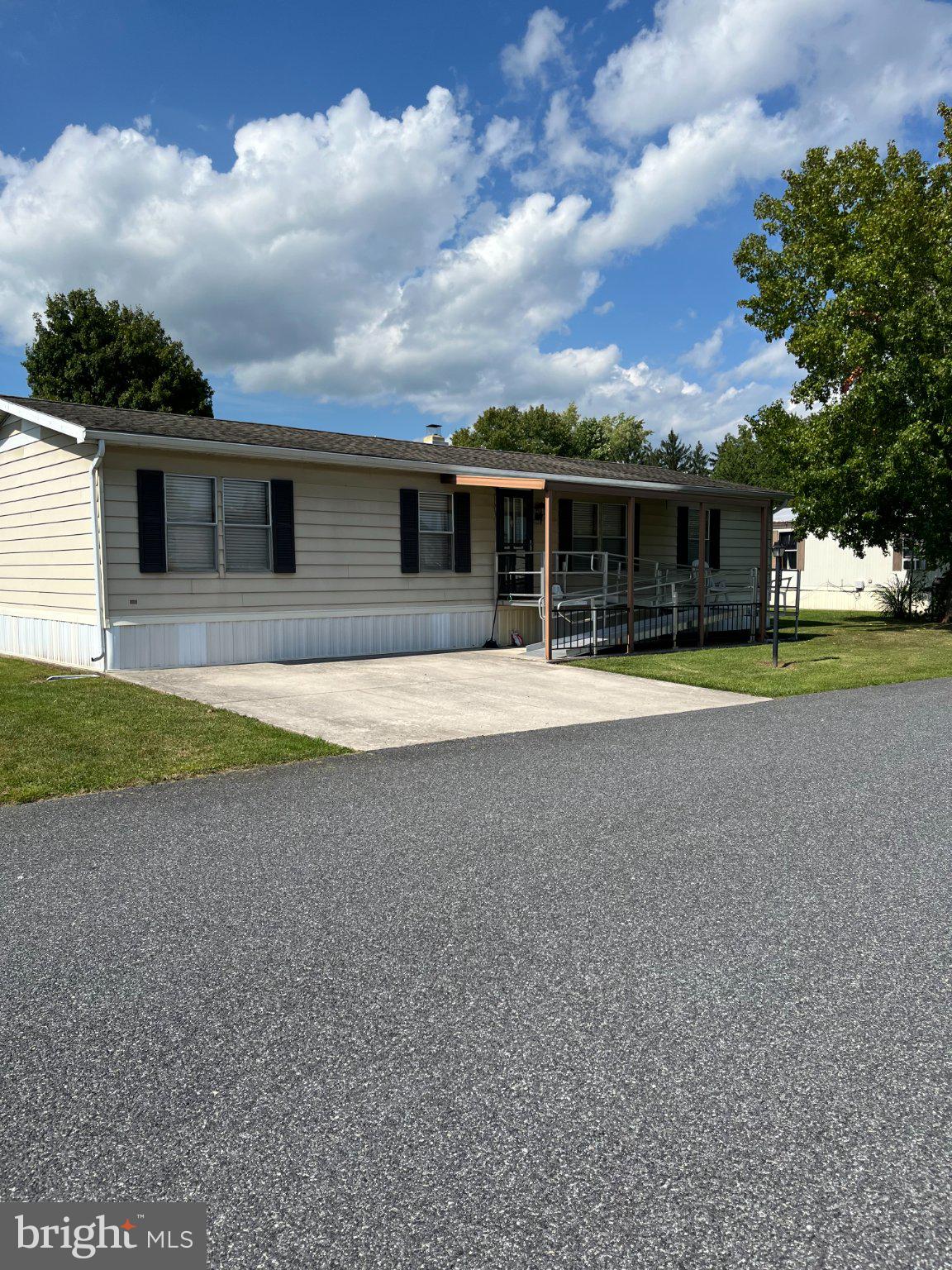 Well-maintained 3-bedroom, 2-full-bath double-wide located in Lincoln Estate Mobile Home Park. Built in 1985 and offering 1,248 sq. ft. of comfortable living space, this home is in GREAT CONDITION and ready for its new owner. Features include an ADA-accessible front entry with metal ramp, convenient 2-car parking pad, and a covered back porch—perfect for relaxing outdoors. A great opportunity for comfortable, affordable living in a convenient community setting.  Don't miss out!!